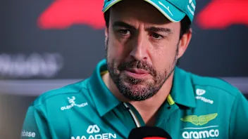 MIAMI, FLORIDA - APRIL 30: Fernando Alonso of Spain and Aston Martin F1 Team talks to the media