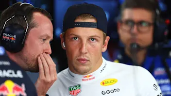 ZANDVOORT, NETHERLANDS - AUGUST 21: Liam Lawson of New Zealand and Oracle Red Bull Racing talks in