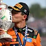 BUDAPEST, HUNGARY - JULY 26: Race winner Lando Norris of Great Britain and McLaren kisses his