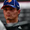 SINGAPORE, SINGAPORE - OCTOBER 10: Lando Norris of Great Britain and McLaren talks to the media