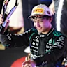 SINGAPORE, SINGAPORE - OCTOBER 11: Third placed Andrea Kimi Antonelli of Italy and Mercedes AMG