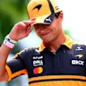 KUALA LUMPUR, MALAYSIA - OCTOBER 01: Lando Norris of Great Britain and McLaren walks in the Paddock