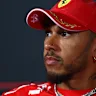 MONZA, ITALY - SEPTEMBER 03: Lewis Hamilton of Great Britain and Scuderia Ferrari looks on in the