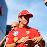 MONZA, ITALY - SEPTEMBER 03: Charles Leclerc of Monaco and Scuderia Ferrari signs autographs for