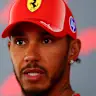 MADRID, SPAIN - SEPTEMBER 10: Lewis Hamilton of Great Britain and Scuderia Ferrari talks to the