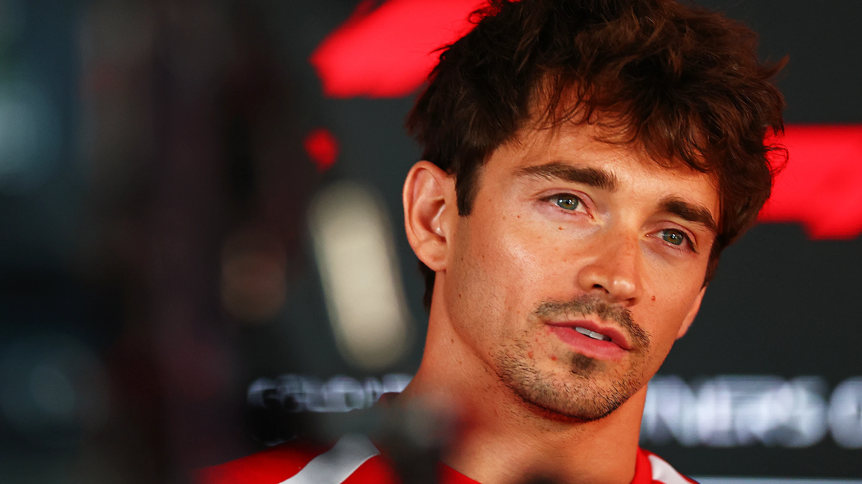 BUDAPEST, HUNGARY - JULY 23: Charles Leclerc of Monaco and Scuderia Ferrari talks to the media