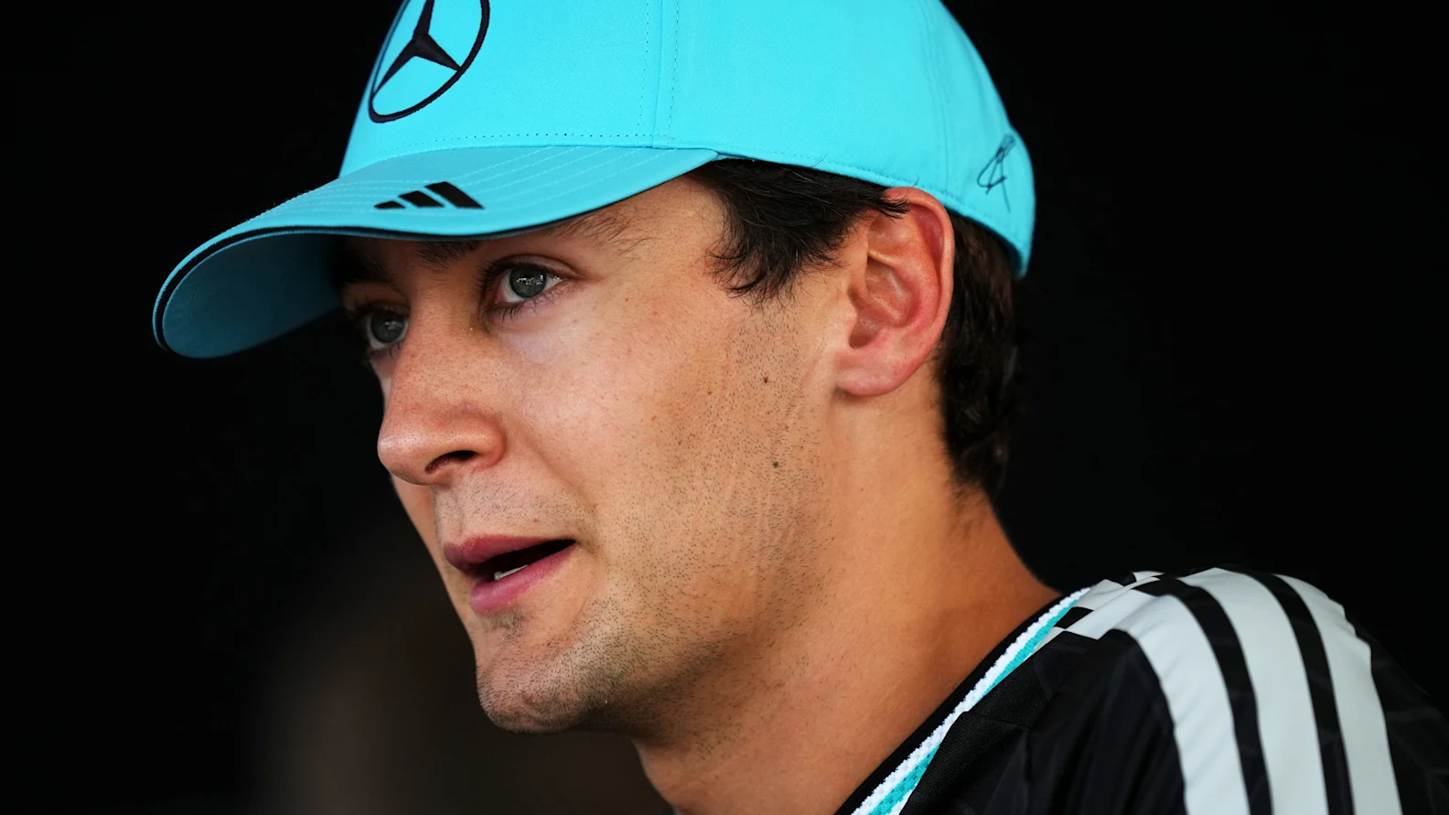 KUALA LUMPUR, MALAYSIA - OCTOBER 03: Eighth placed qualifier George Russell of Great Britain and Mercedes AMG Petronas F1 Team is interviewed during qualifying ahead of the F1 Grand Prix of Bahrain in Malaysia at Sepang Circuit on October 03, 2026 in Kuala Lumpur, Malaysia. (Photo by Alex Bierens de Haan/LAT Images)