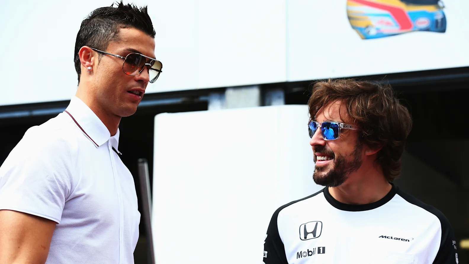 MONTE-CARLO, MONACO - MAY 24:  Real Madrid footballer Cristiano Ronaldo meets Fernando Alonso of Spain and McLaren Honda in the pitlane before the Monaco Formula One Grand Prix at Circuit de Monaco on May 24, 2015 in Monte-Carlo, Monaco.  (Photo by Mark Thompson/Getty Images)