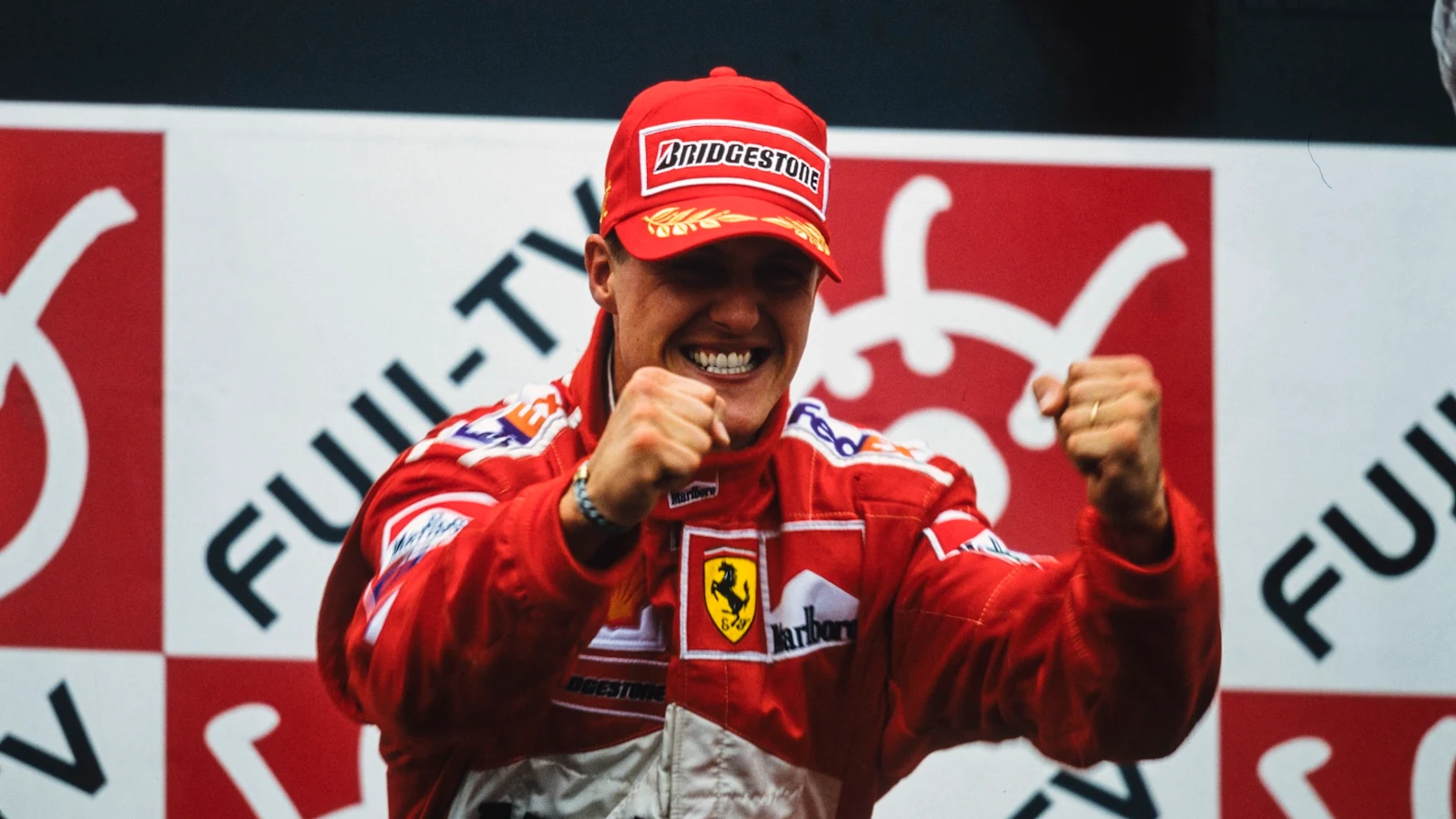 SUZUKA, JAPAN - OCTOBER 08: Michael Schumacher, 1st position, celebrates victory and securing his