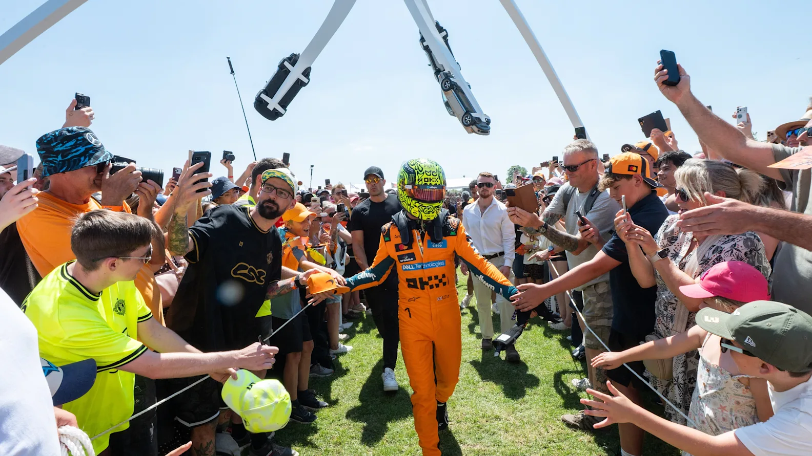F1 World Champion Lando Norris was welcomed by a huge crowd at Goodwood (PA Media)
