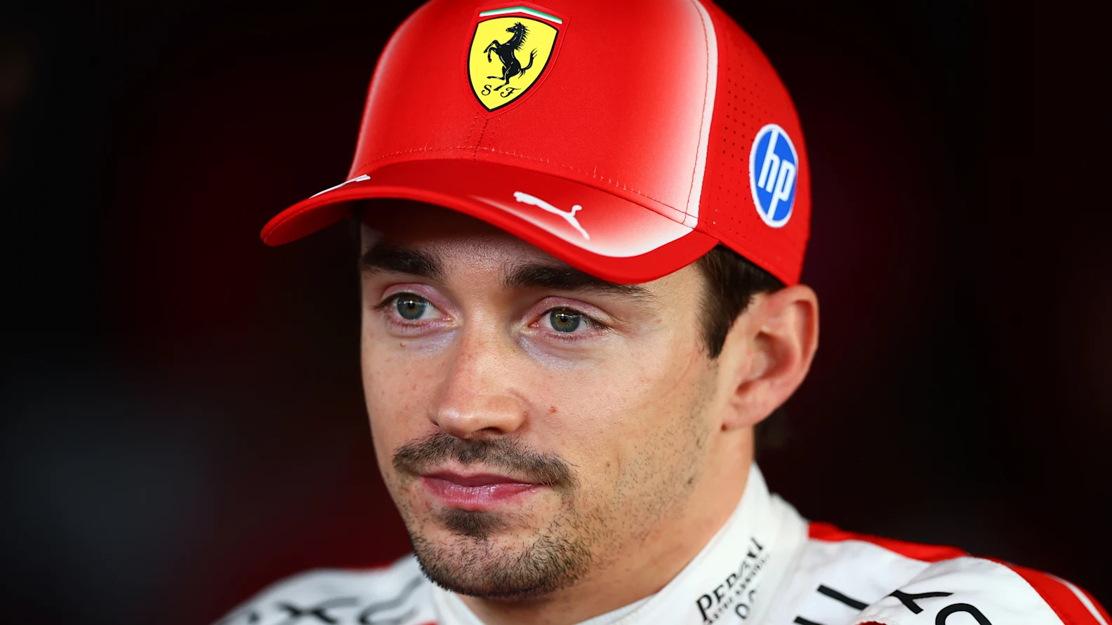SUZUKA, JAPAN - MARCH 28: Fourth placed qualifier Charles Leclerc of Monaco and Scuderia Ferrari is