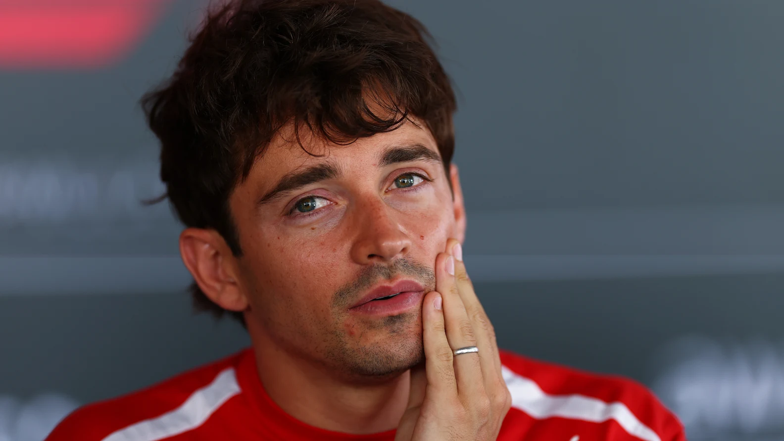 BARCELONA, SPAIN - JUNE 11: Charles Leclerc of Monaco and Scuderia Ferrari talks to the media