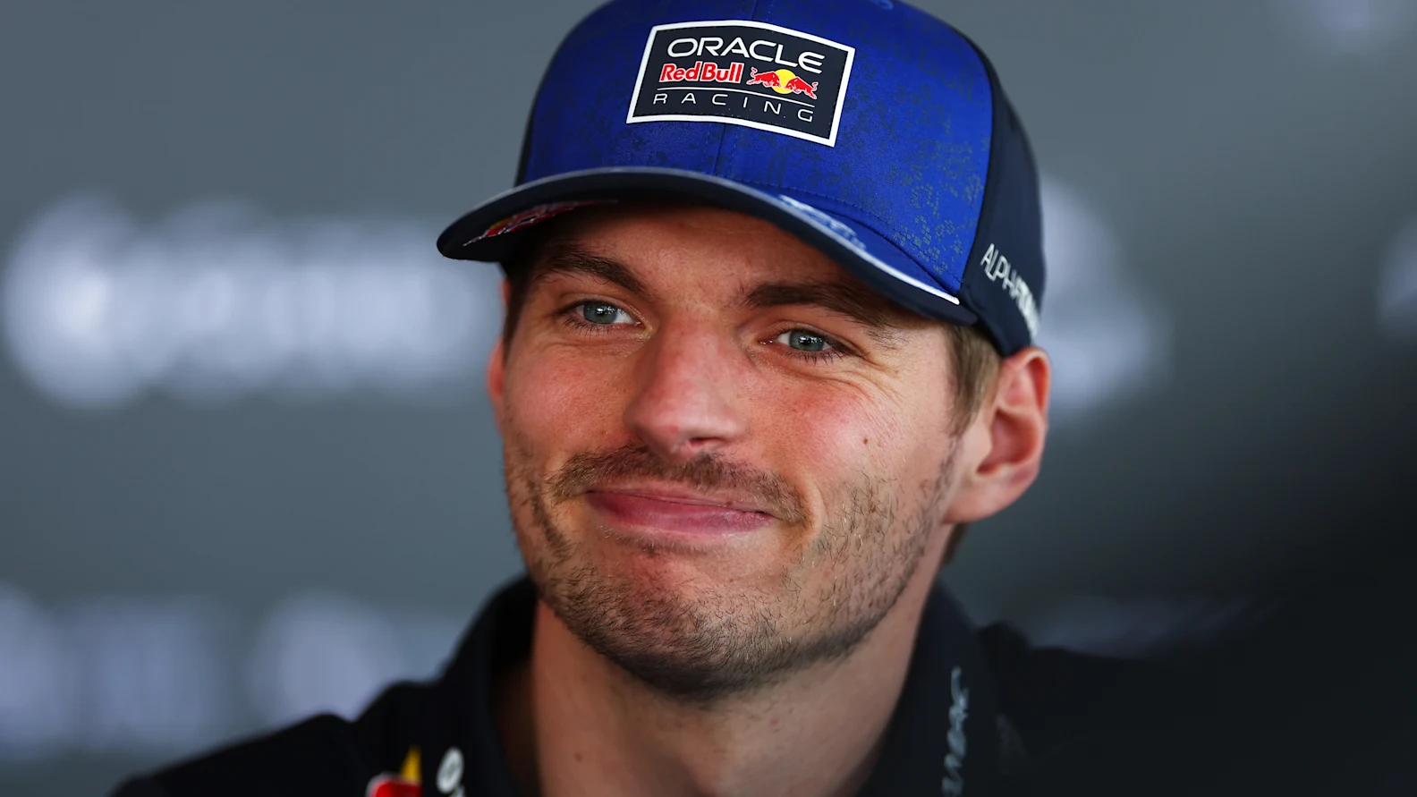 BARCELONA, SPAIN - JUNE 11: Max Verstappen of the Netherlands and Oracle Red Bull Racing talks to