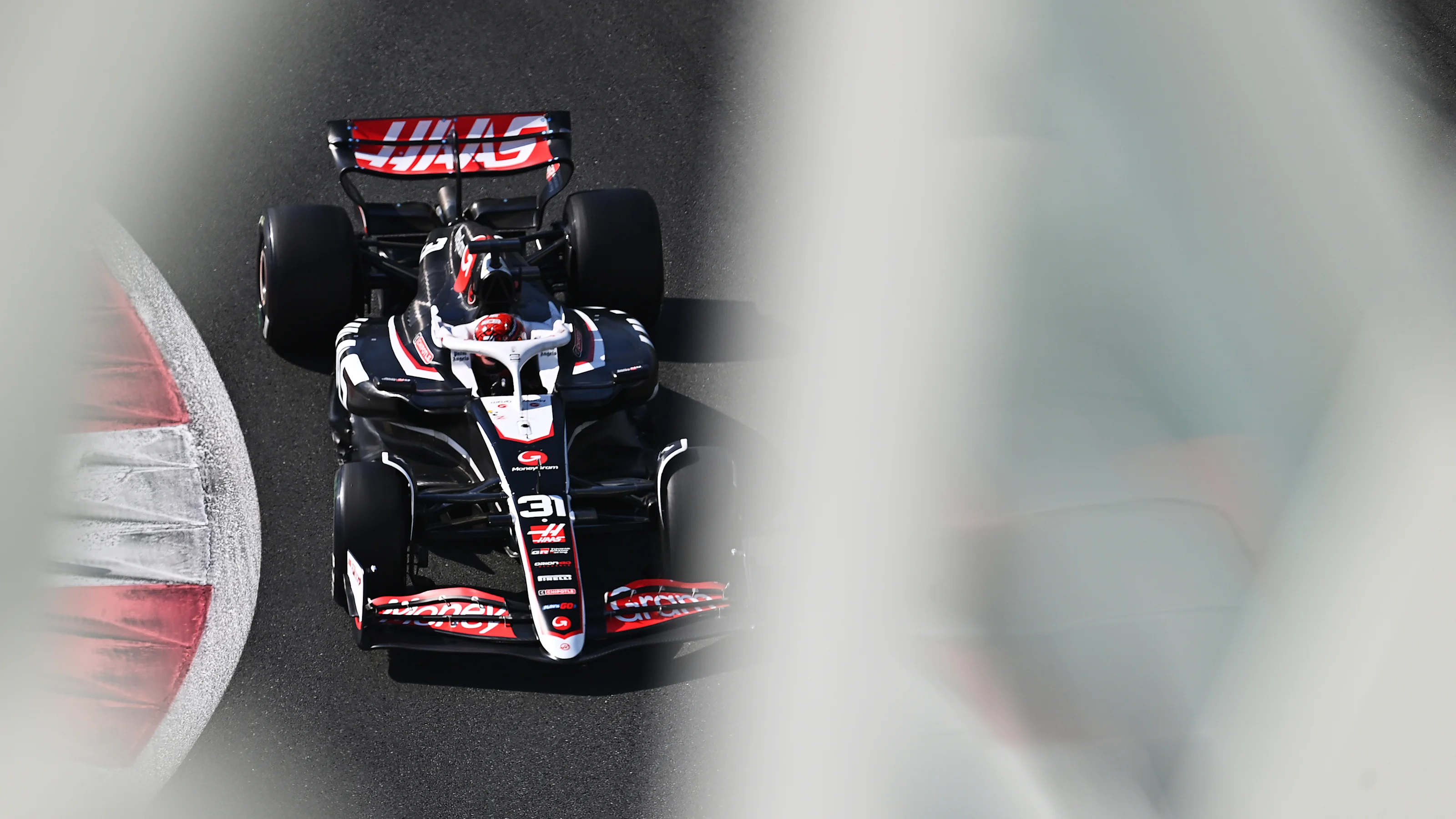 ABU DHABI, UNITED ARAB EMIRATES - DECEMBER 10: Esteban Ocon of France driving the (31) Haas F1
