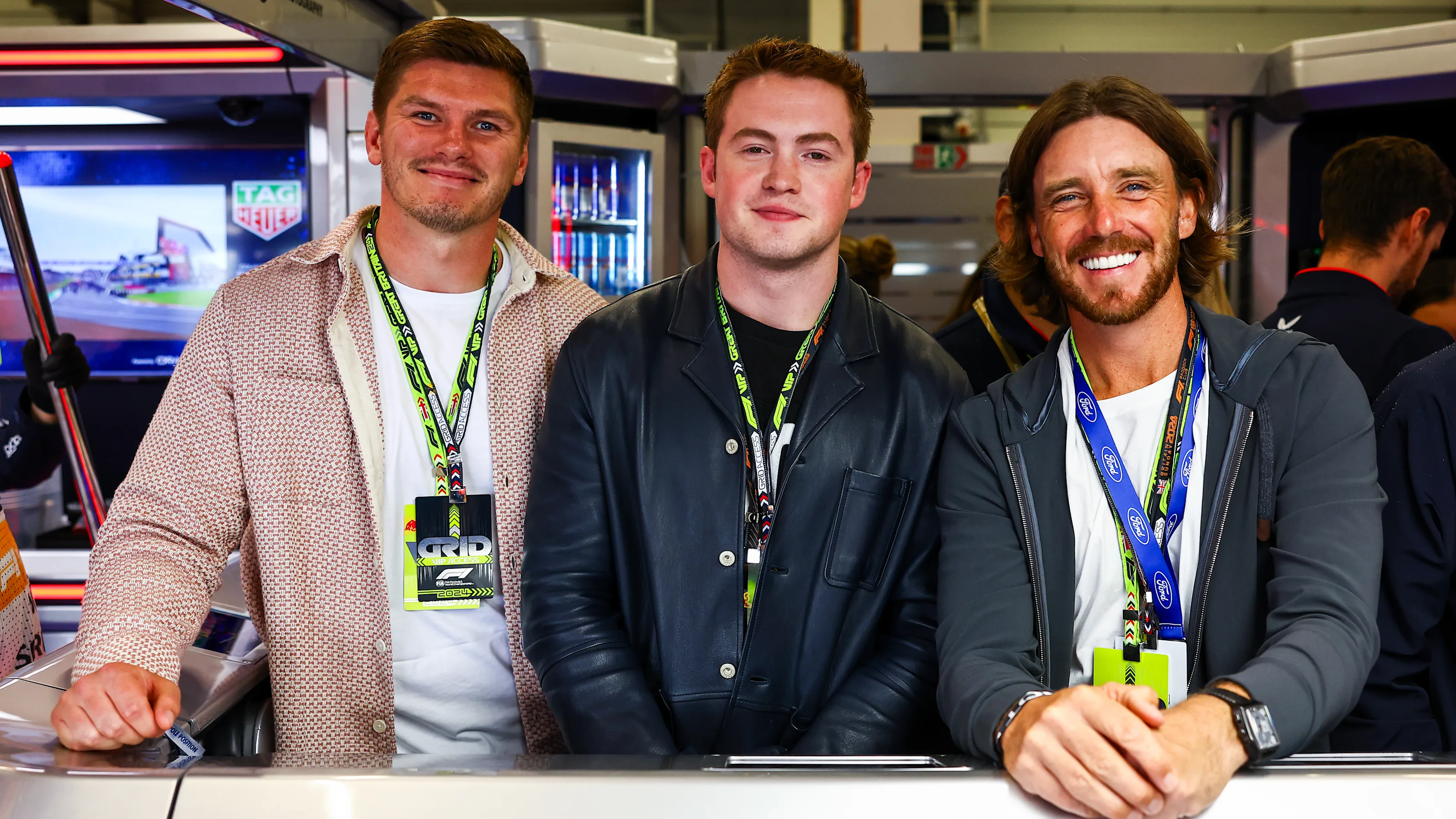NORTHAMPTON, ENGLAND - JULY 07: Owen Farrell, Kit Connor and Tommy Fleetwood pose for a photo in