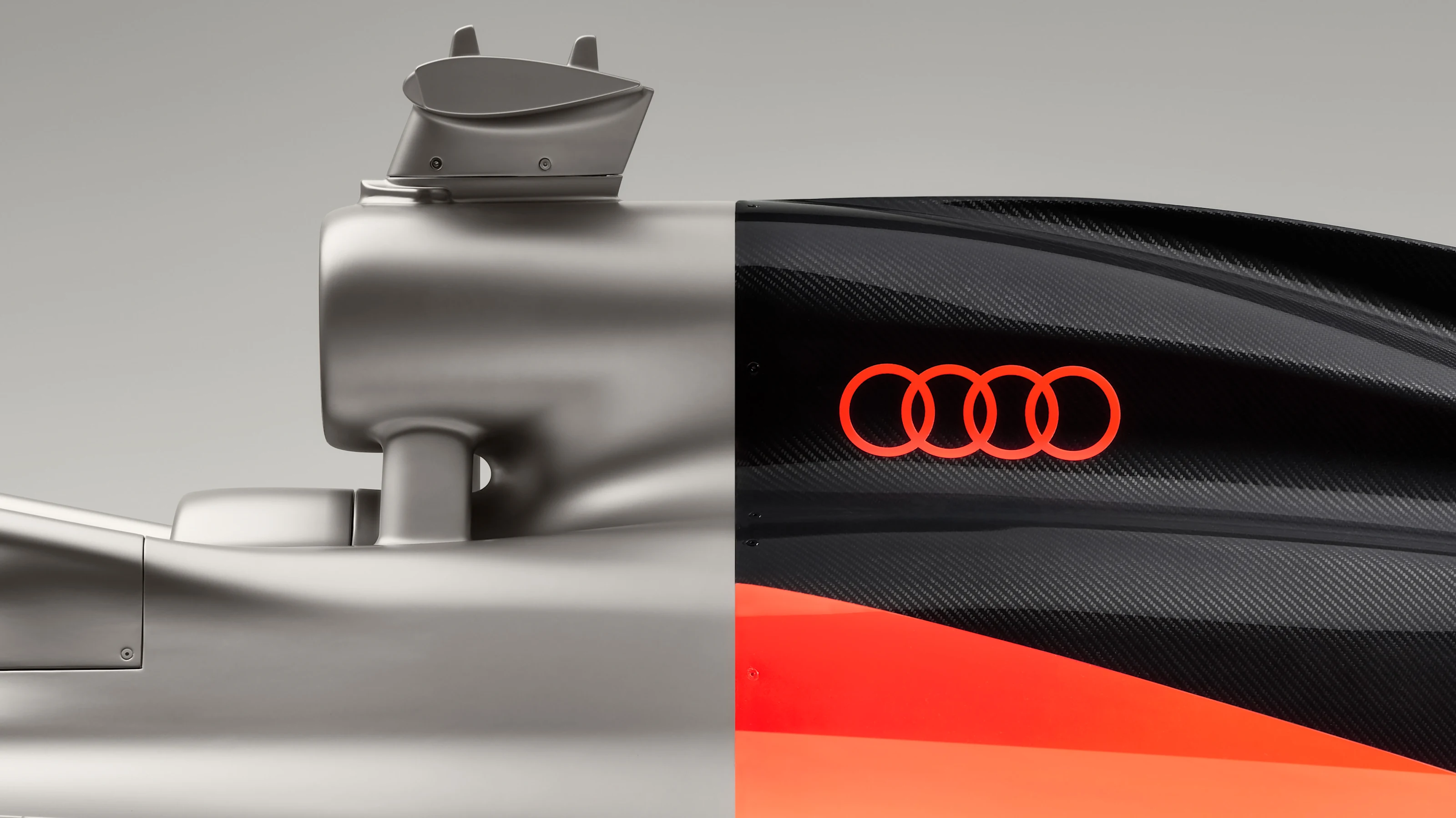 Indoor studio shot, exterior, side view, detail of air intake and engine cover