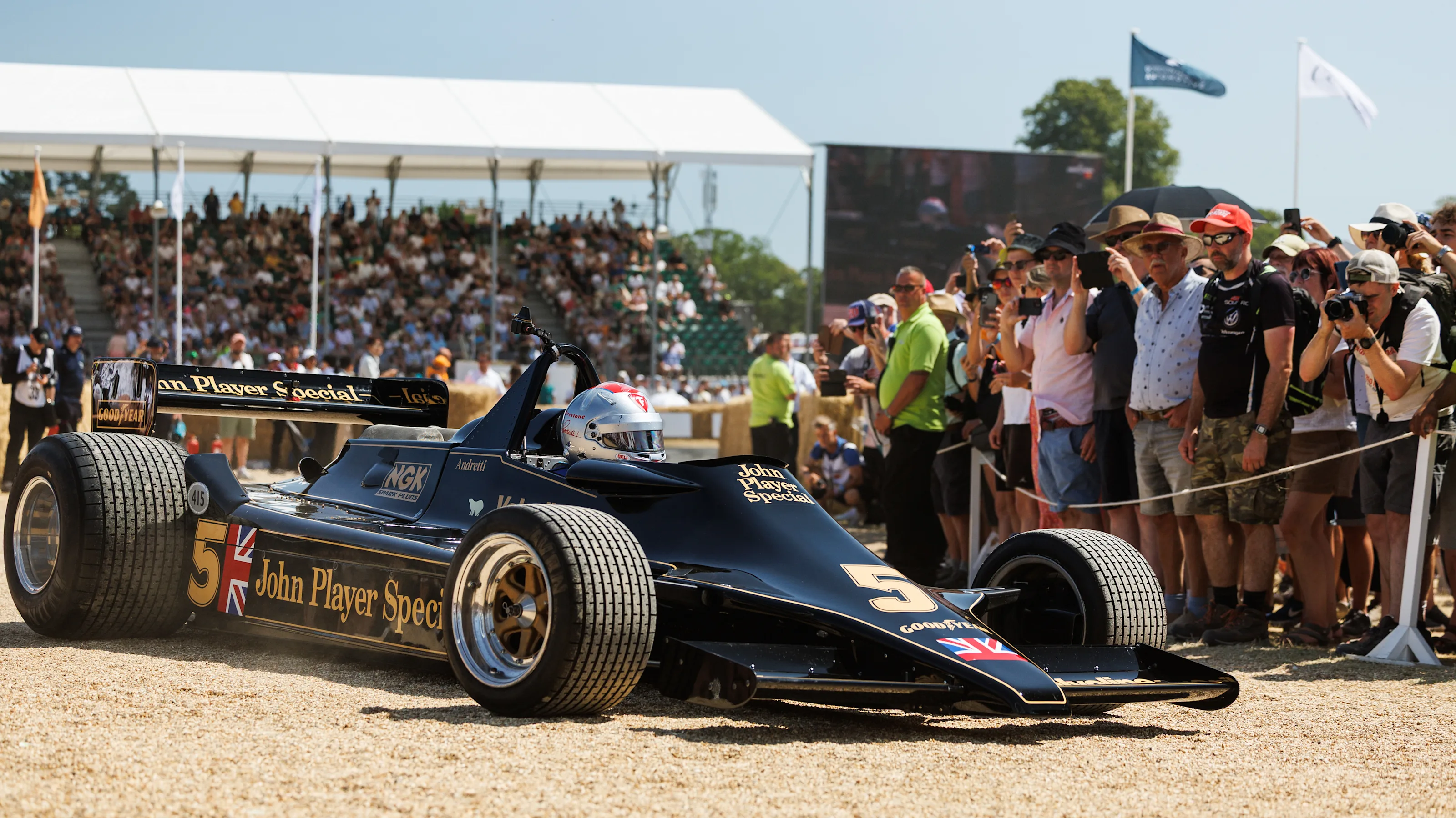 CHICHESTER, ENGLAND - JULY 12: Mario Andretti driving in his Lotus during the Goodwood Festival of