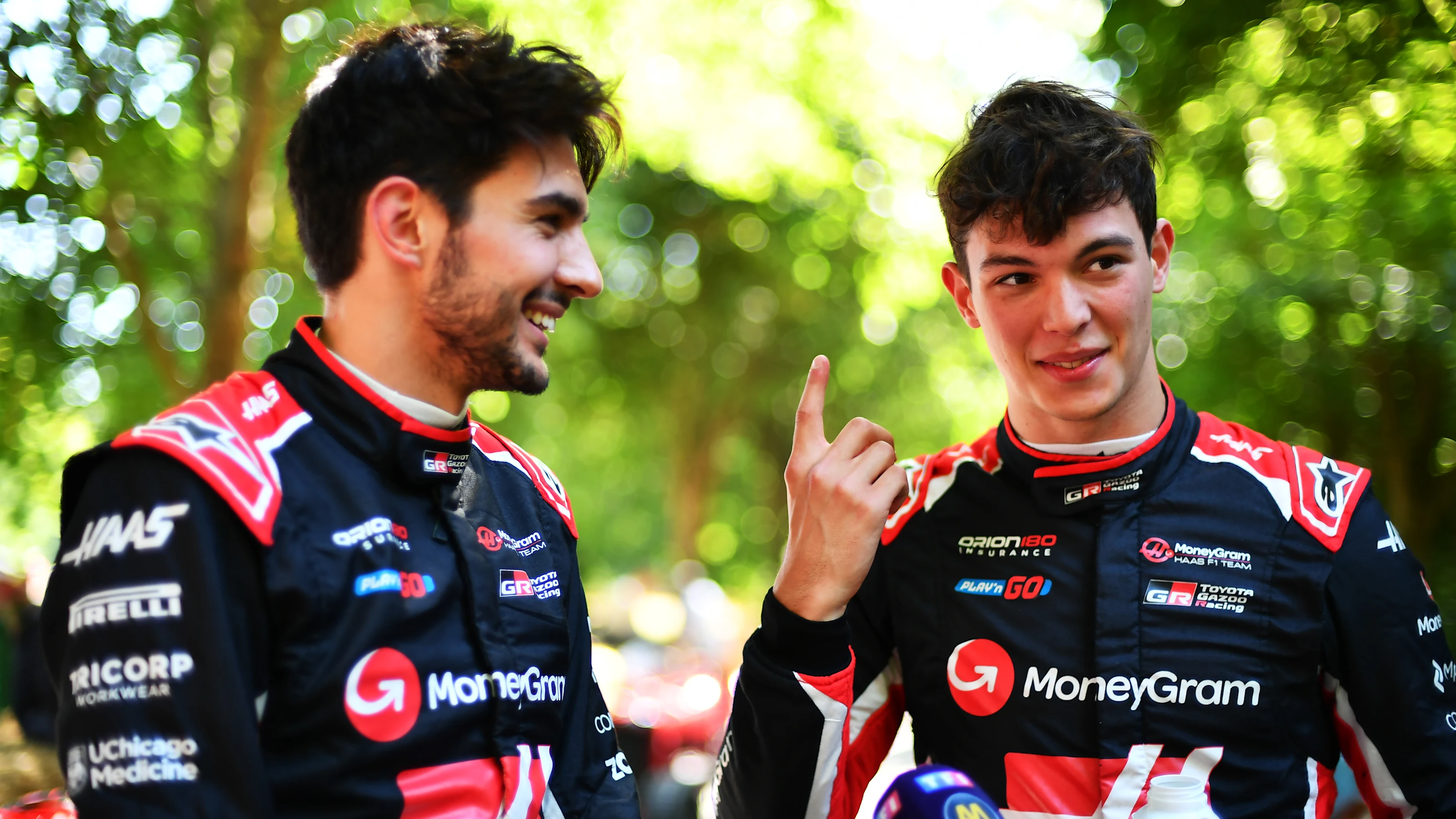 CHICHESTER, ENGLAND - JULY 12: Esteban Ocon of France and Haas F1 and Oliver Bearman of Great