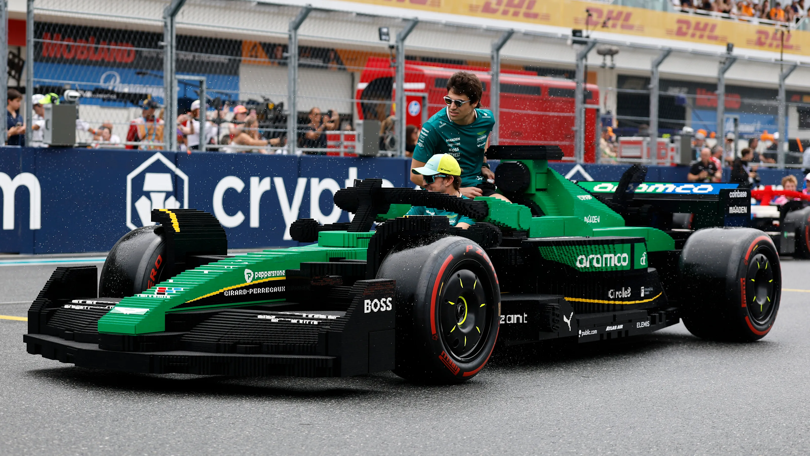 MIAMI, FLORIDA - MAY 04: Fernando Alonso of Spain and Aston Martin F1 Team and Lance Stroll of