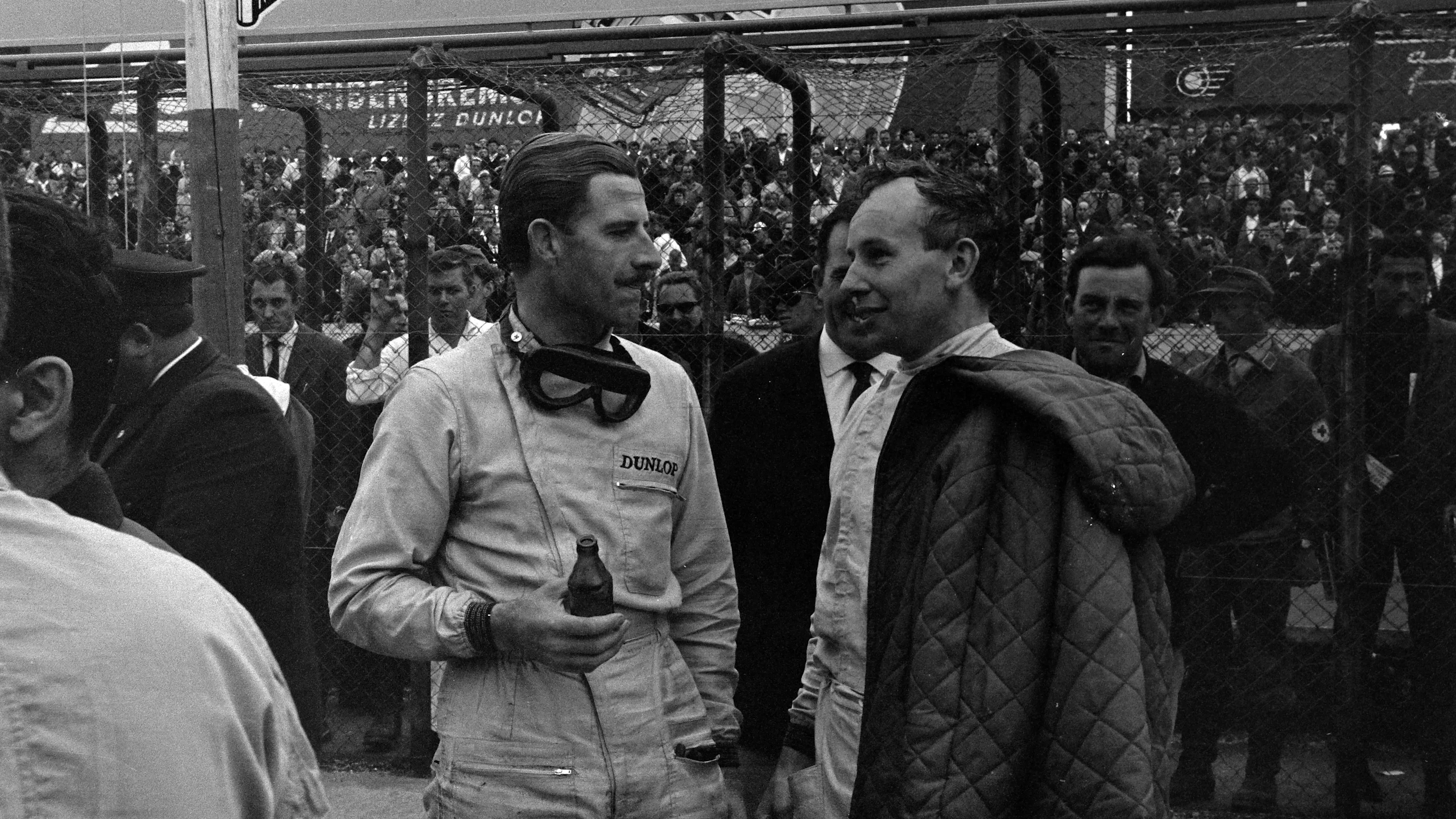 1964 Formula 1 German GP, Nürburgring: Graham Hill and John Surtees. (Photo by LAT Images)