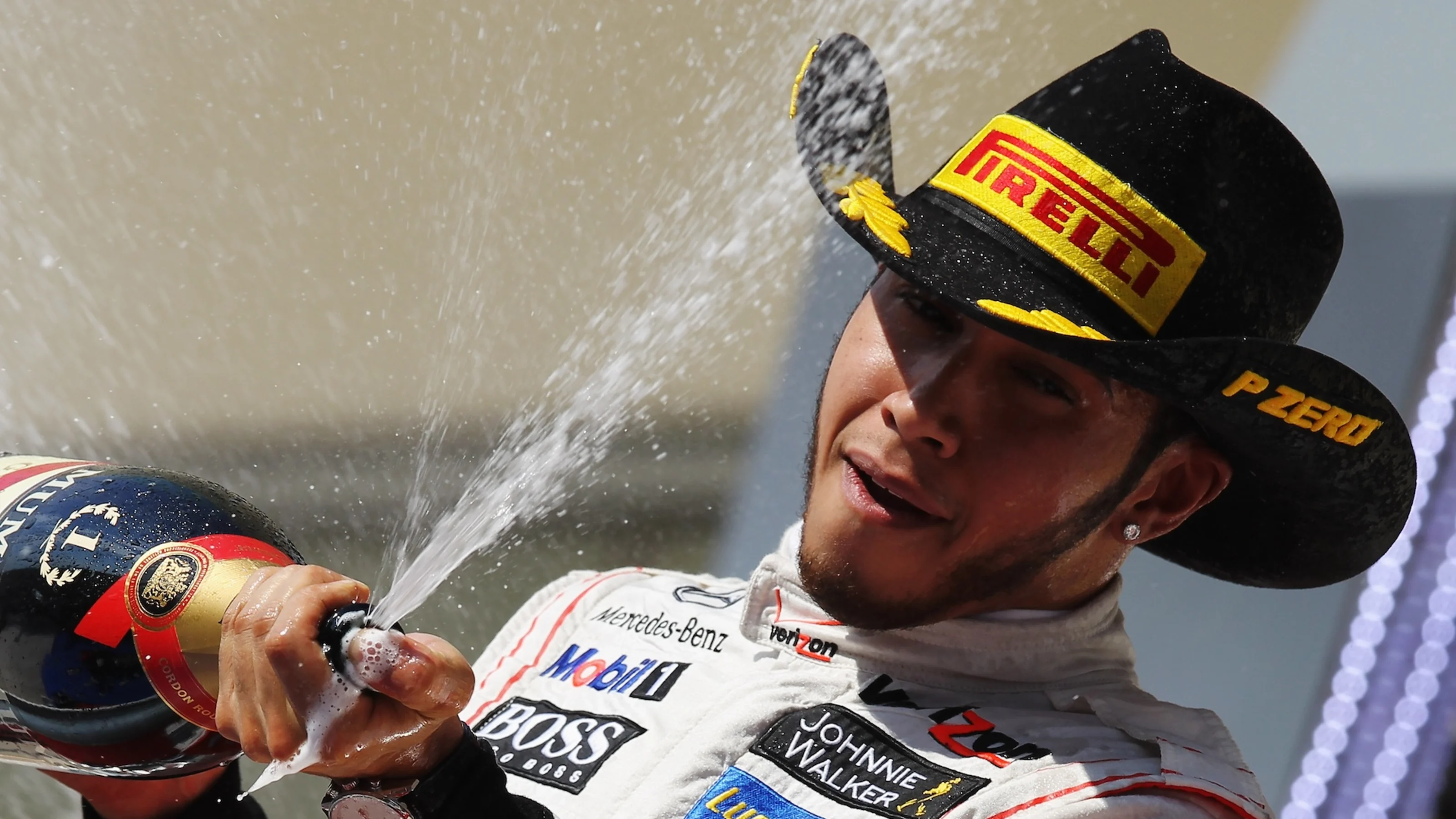 AUSTIN, TX - NOVEMBER 18:  Lewis Hamilton of Great Britain and McLaren celebrates on the podium