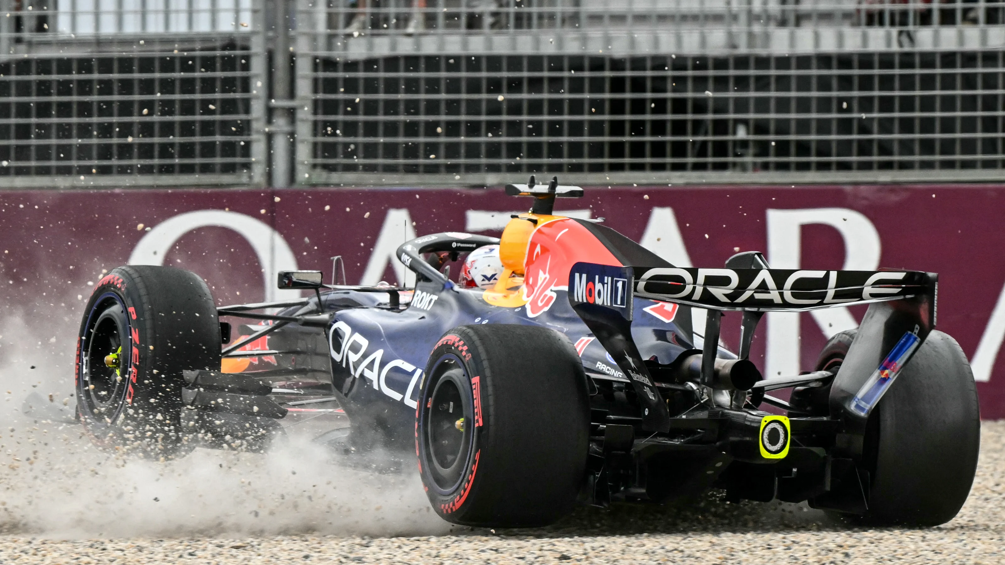 Red Bull Racing's Dutch driver Max Verstappen crashes during the qualifying session of the Formula