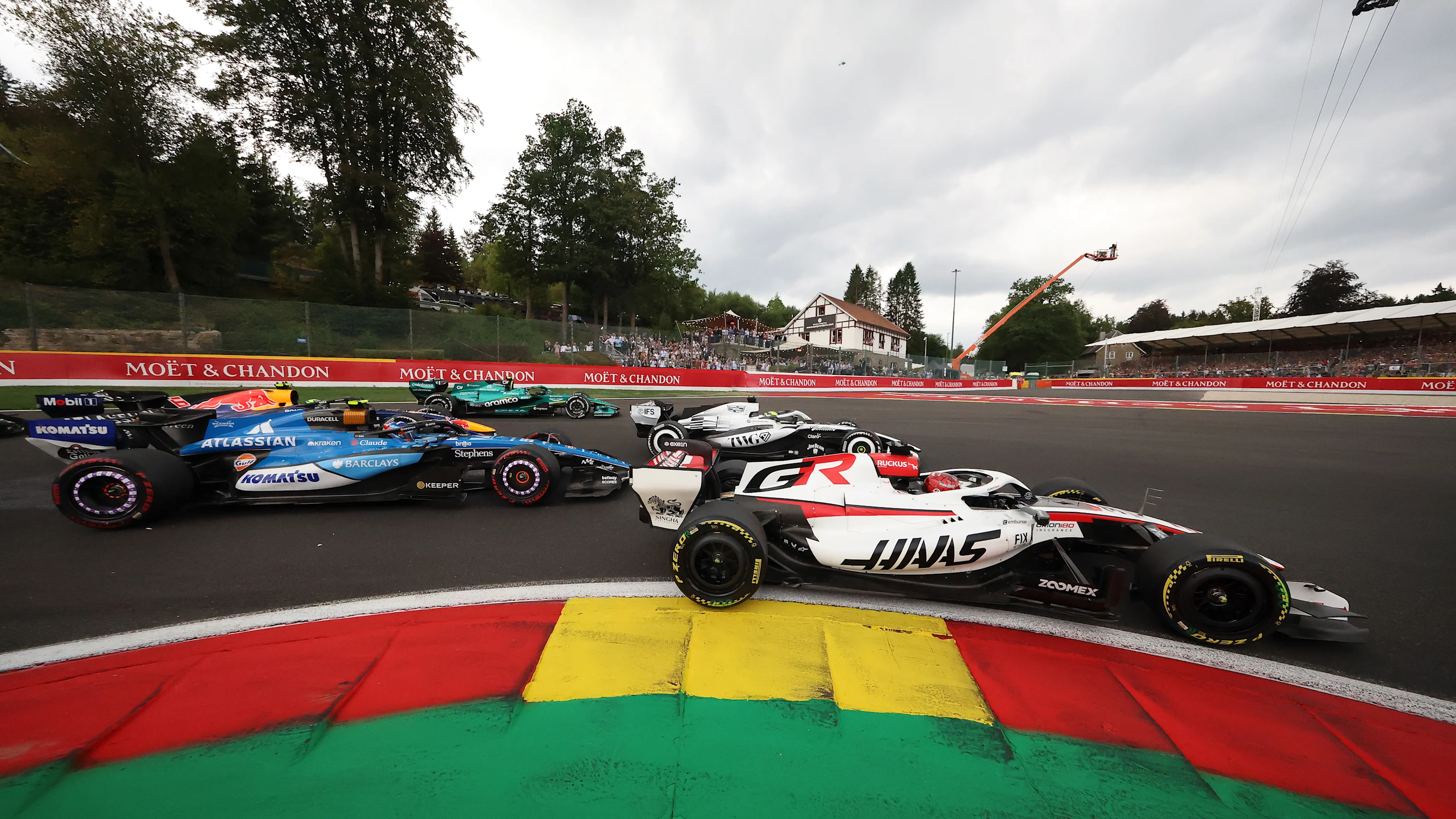 SPA, BELGIUM - JULY 19: Esteban Ocon of France driving the (31) Haas F1 VF-26 Ferrari leads Sergio