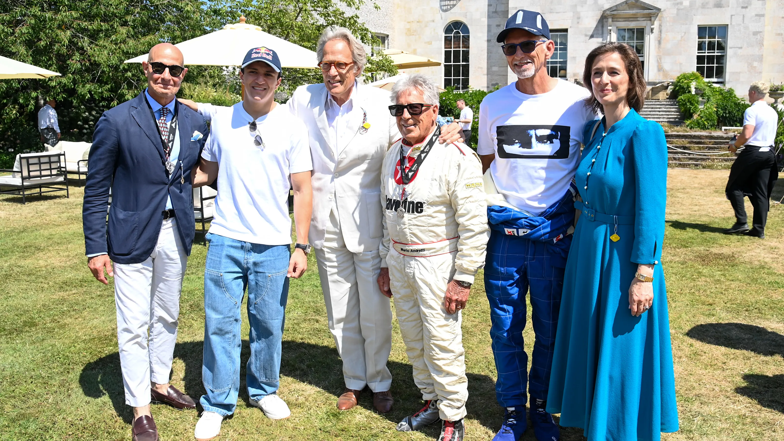CHICHESTER, ENGLAND - JULY 12: (L to R) Stanley Tucci, Isack Hadjar of France and Visa Cash App