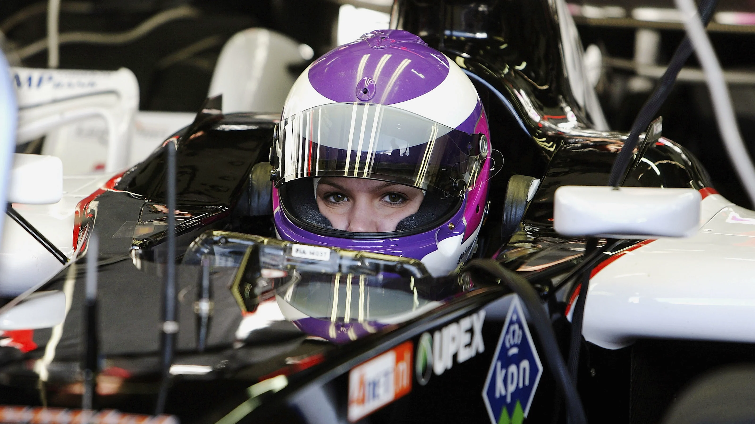 VALLELUNGA, ITALY - NOVEMBER 22: Katherine Legge of Great Britain prepares to drive a Minardi