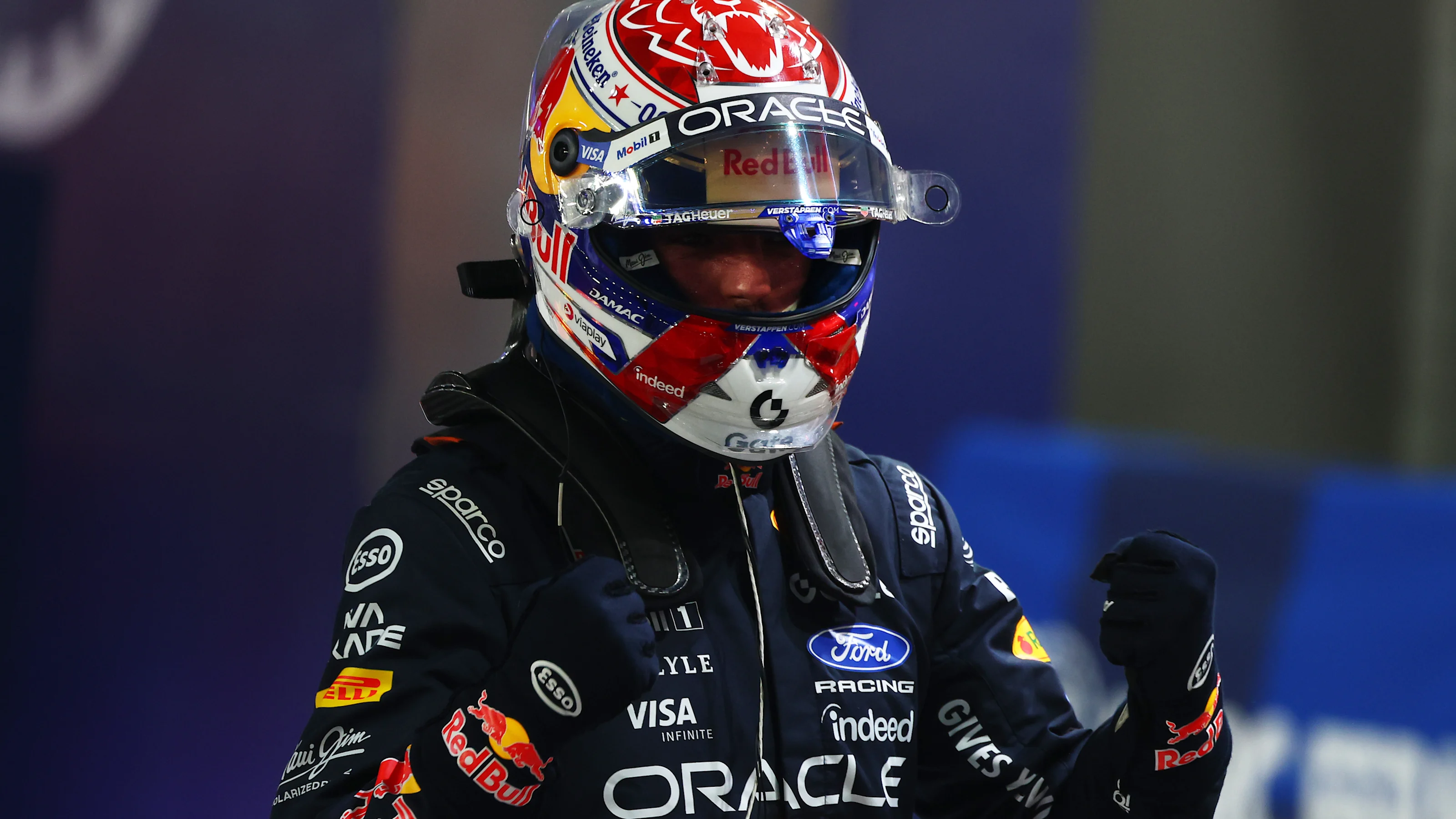 SINGAPORE, SINGAPORE - OCTOBER 10: Pole position qualifier Max Verstappen of the Netherlands and