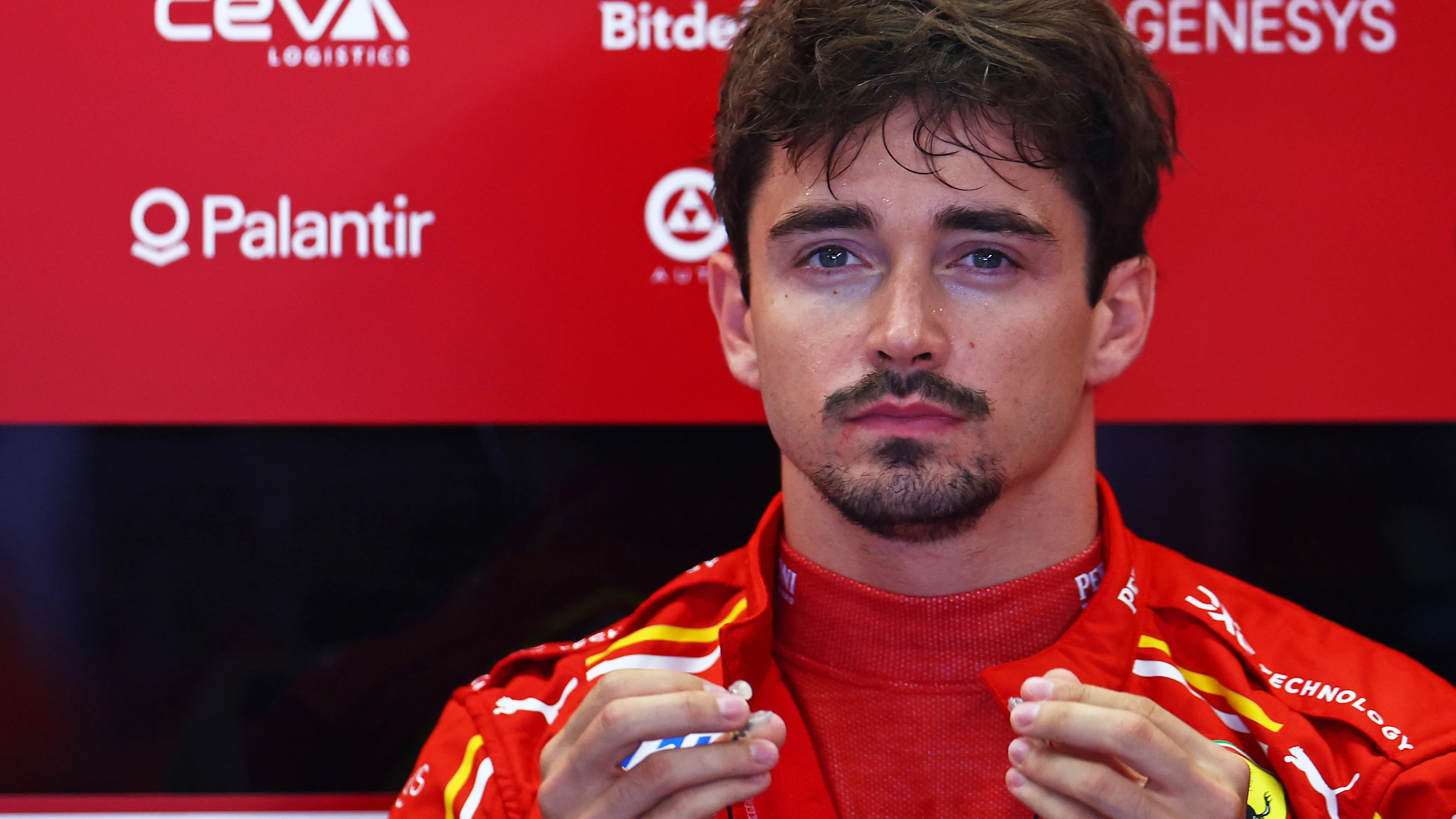 SPIELBERG, AUSTRIA - JUNE 28: Charles Leclerc of Monaco and Ferrari prepares to drive in the garage