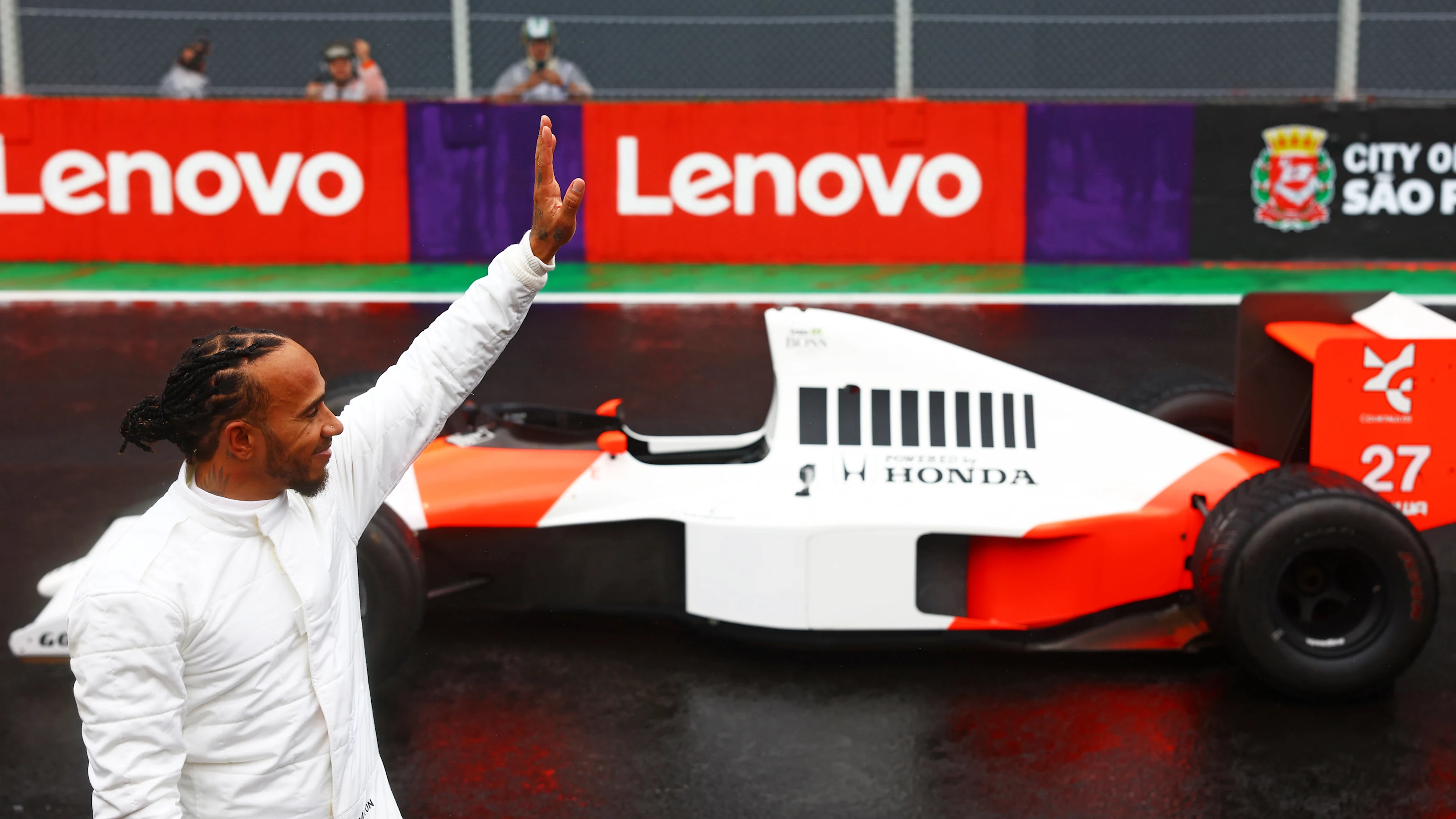 SAO PAULO, BRAZIL - NOVEMBER 03: Lewis Hamilton of Great Britain and Mercedes waves to the crowd