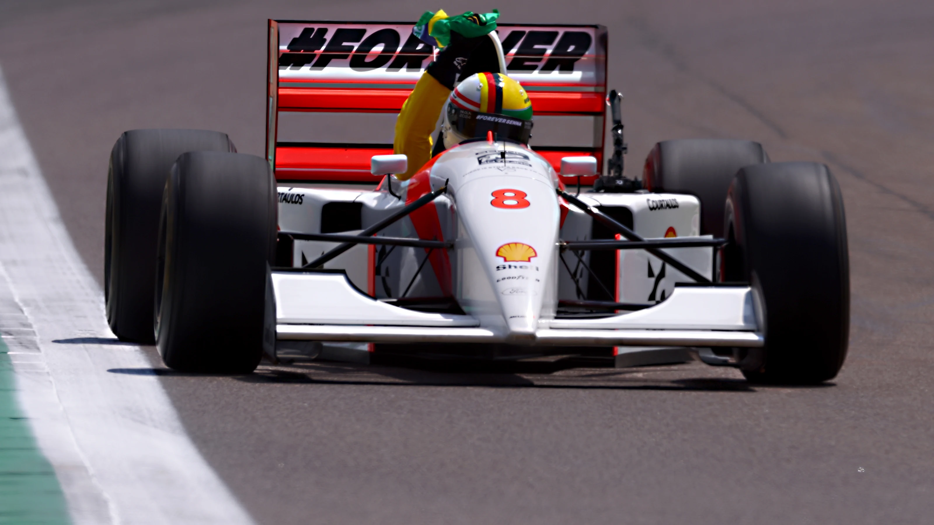 IMOLA, ITALY - MAY 19: Sebastian Vettel drives the McLaren MP4/8 of Ayrton Senna on track prior to