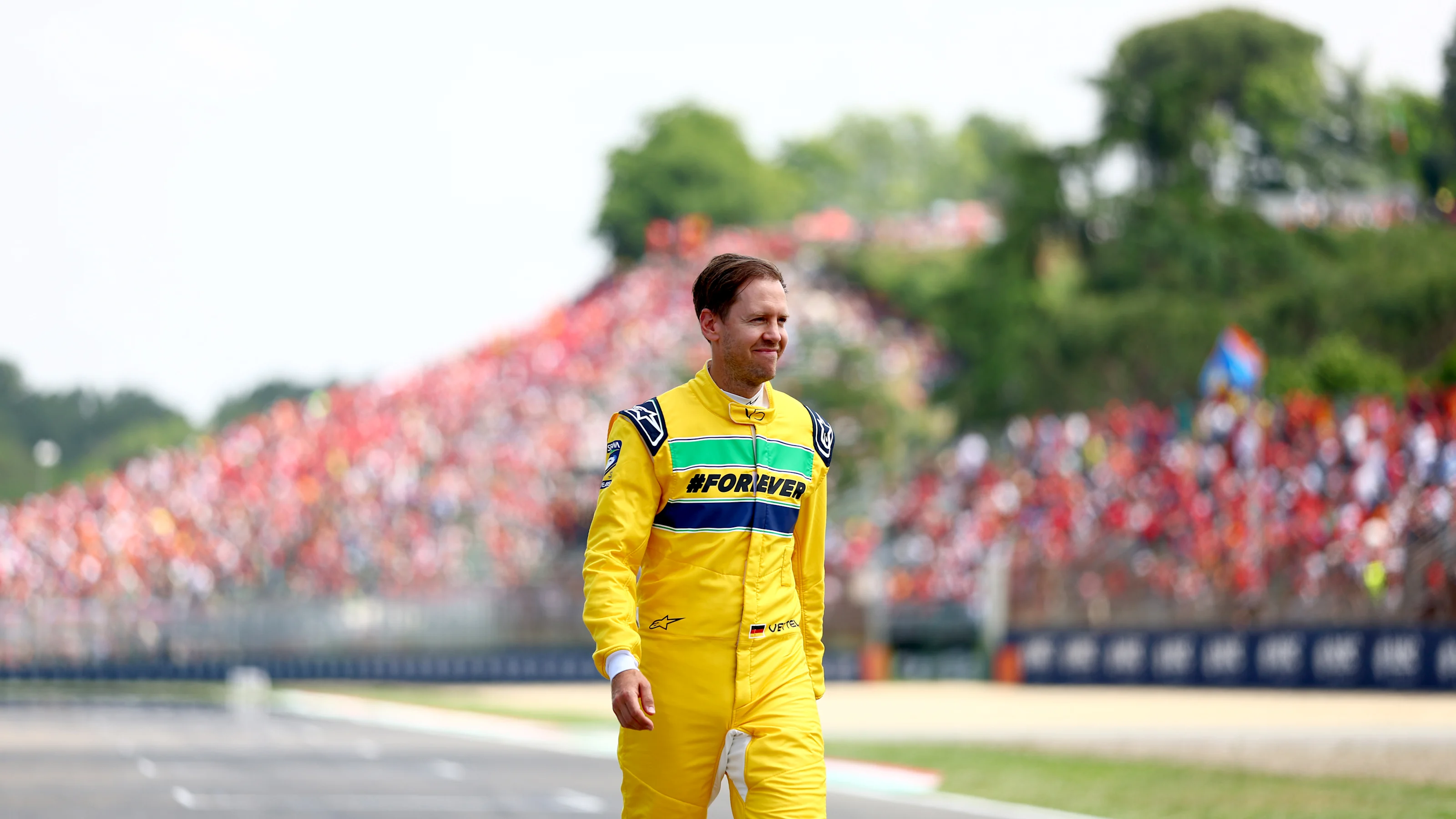 IMOLA, ITALY - MAY 19: Sebastian Vettel prepares to drive the McLaren MP4/8 of Ayrton Senna on