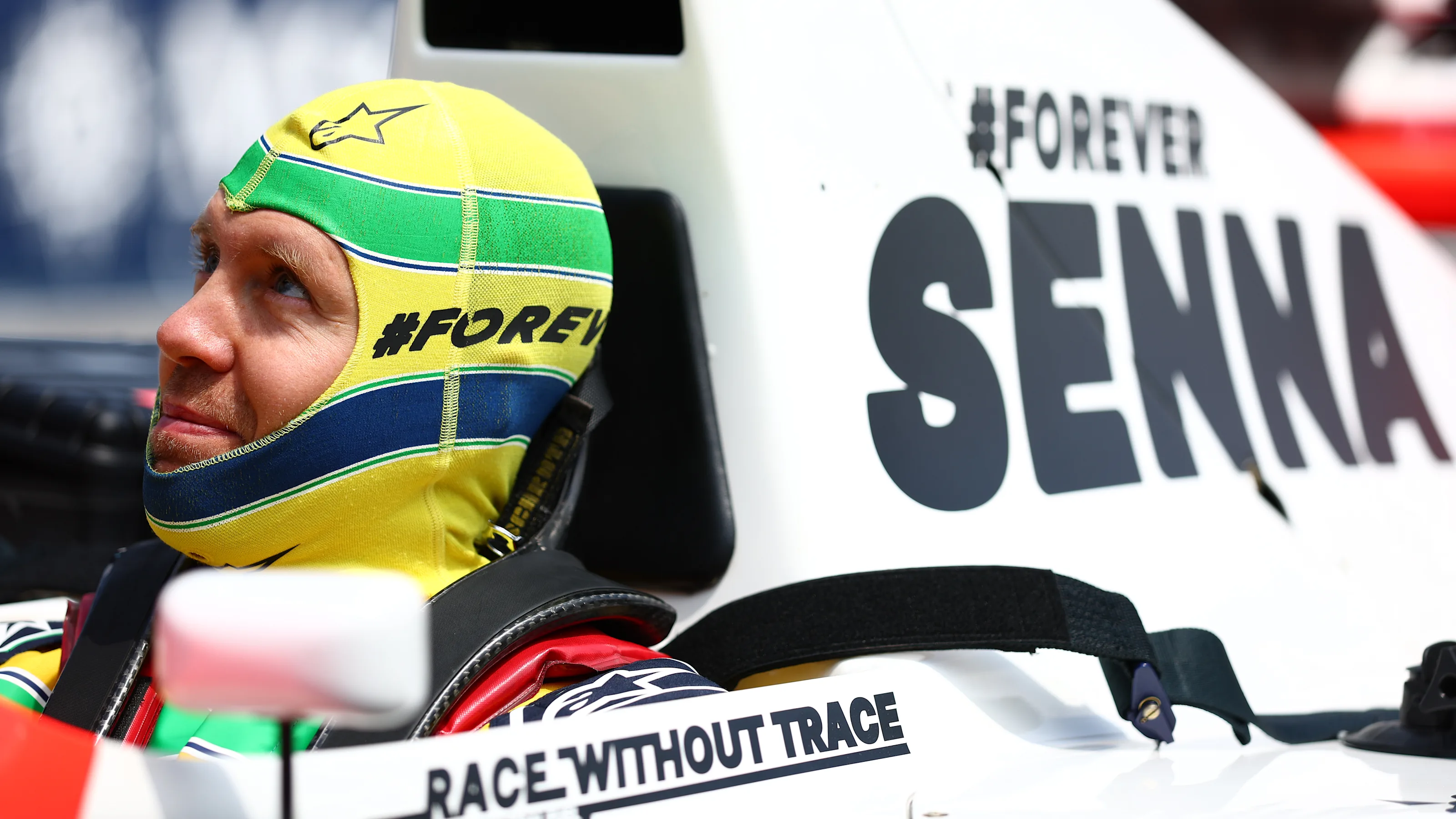 IMOLA, ITALY - MAY 19: Sebastian Vettel prepares to drive the McLaren MP4/8 of Ayrton Senna on