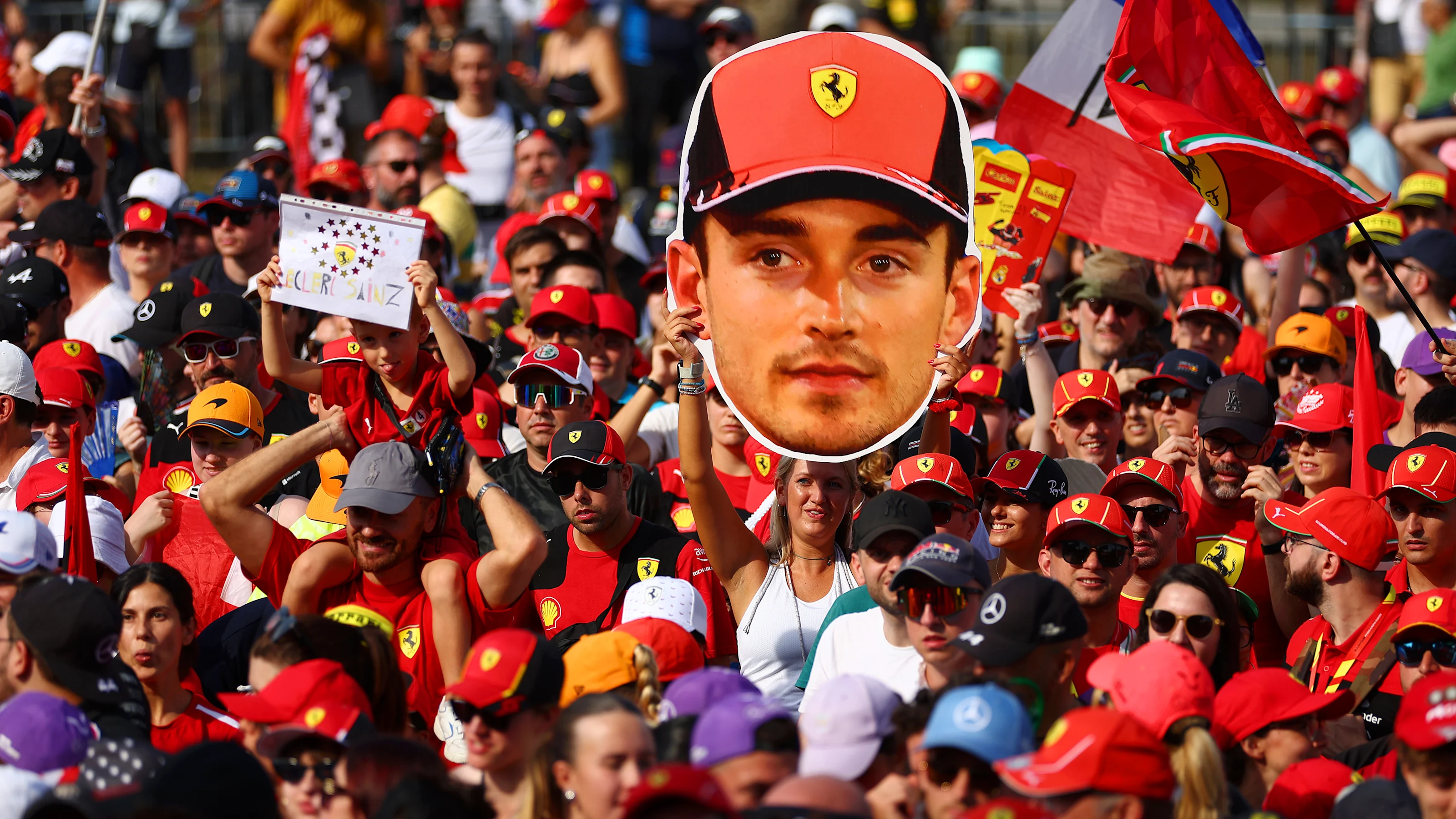 MONZA, ITALY - AUGUST 31: A fan shows their support of Charles Leclerc of Monaco and Ferrari in the