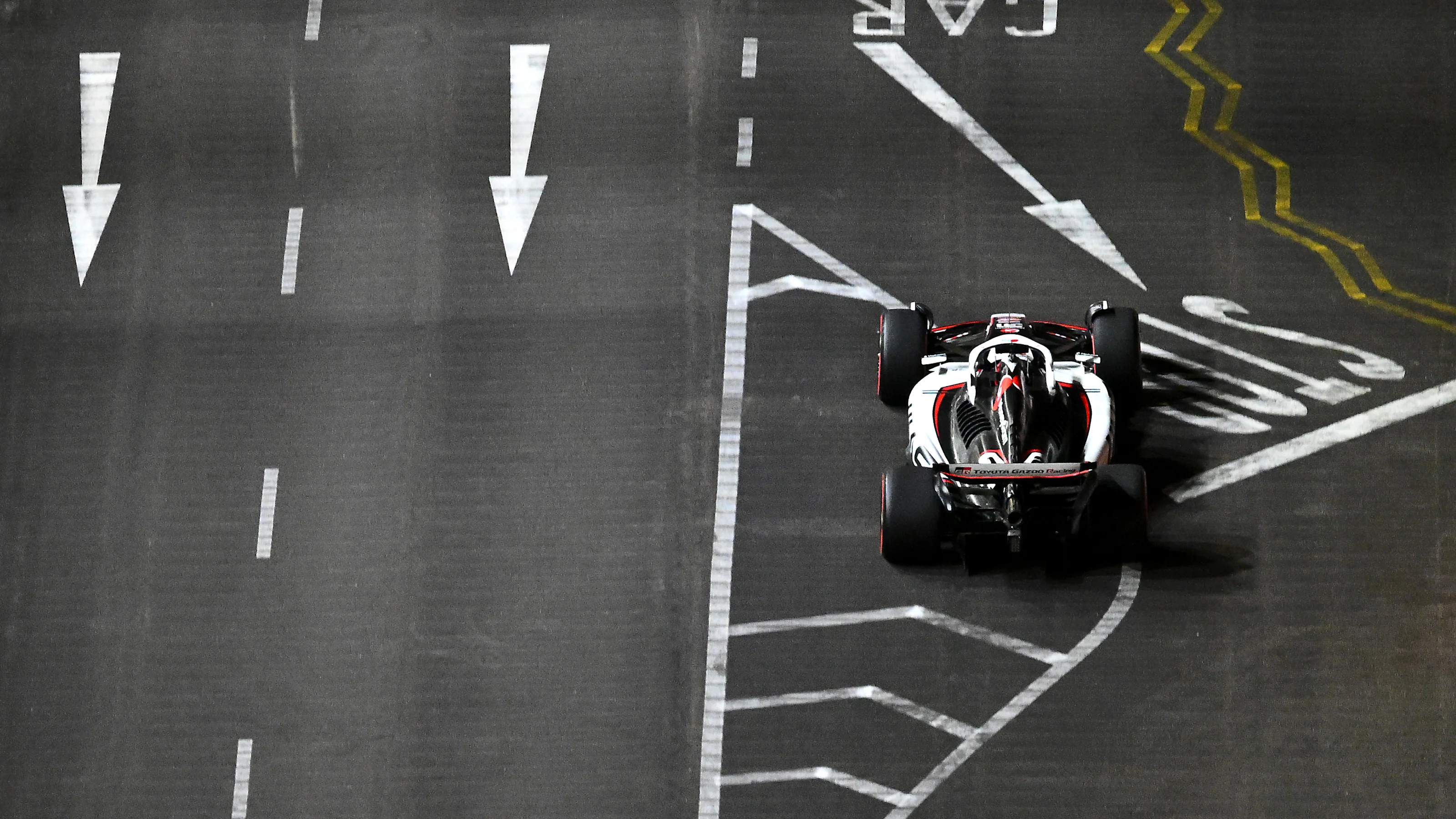SINGAPORE, SINGAPORE - OCTOBER 03: Esteban Ocon of France driving the (31) Haas F1 VF-25 Ferrari on