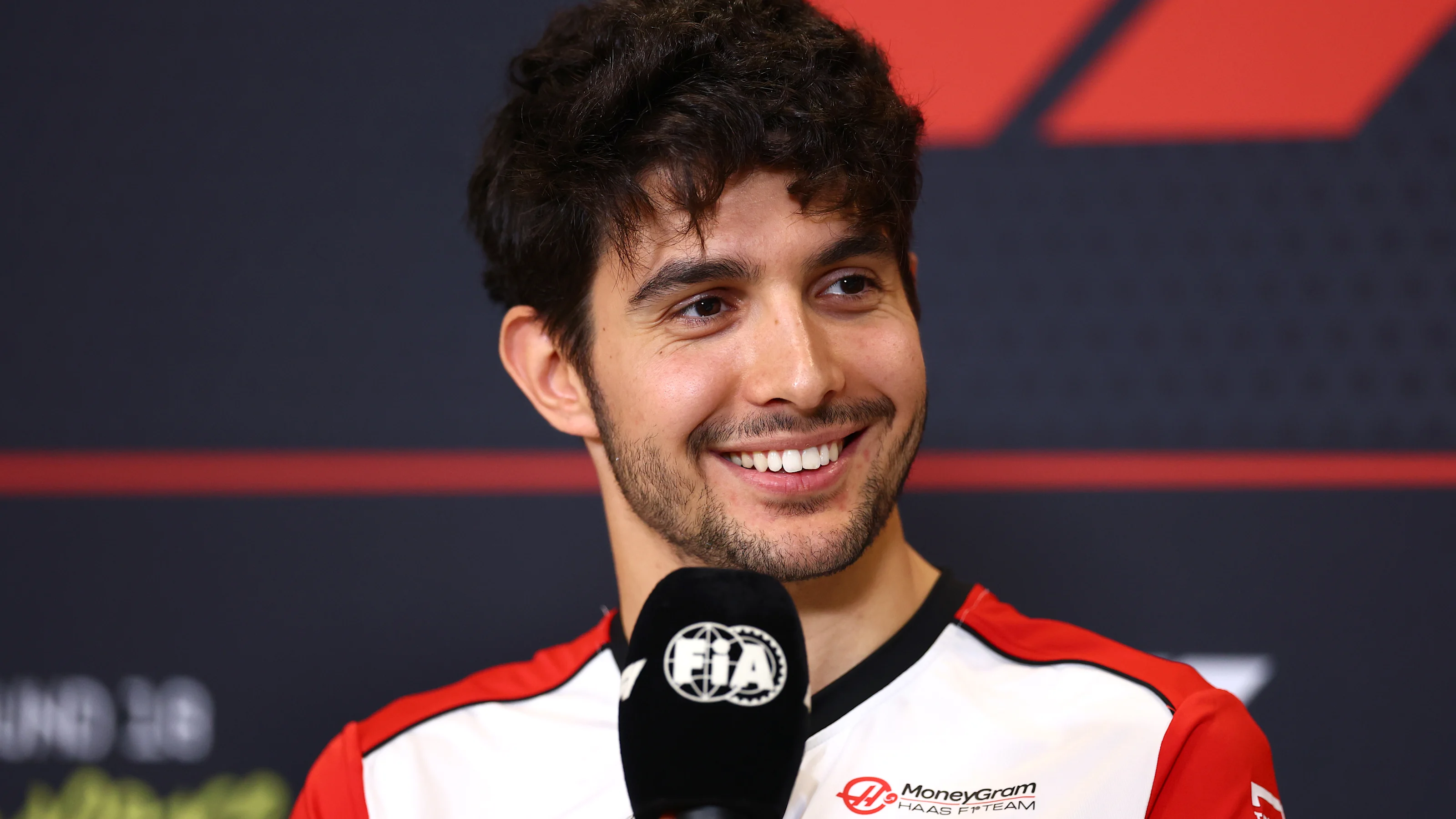SINGAPORE, SINGAPORE - OCTOBER 02: Esteban Ocon of France and Haas F1 speaks in the Drivers Press