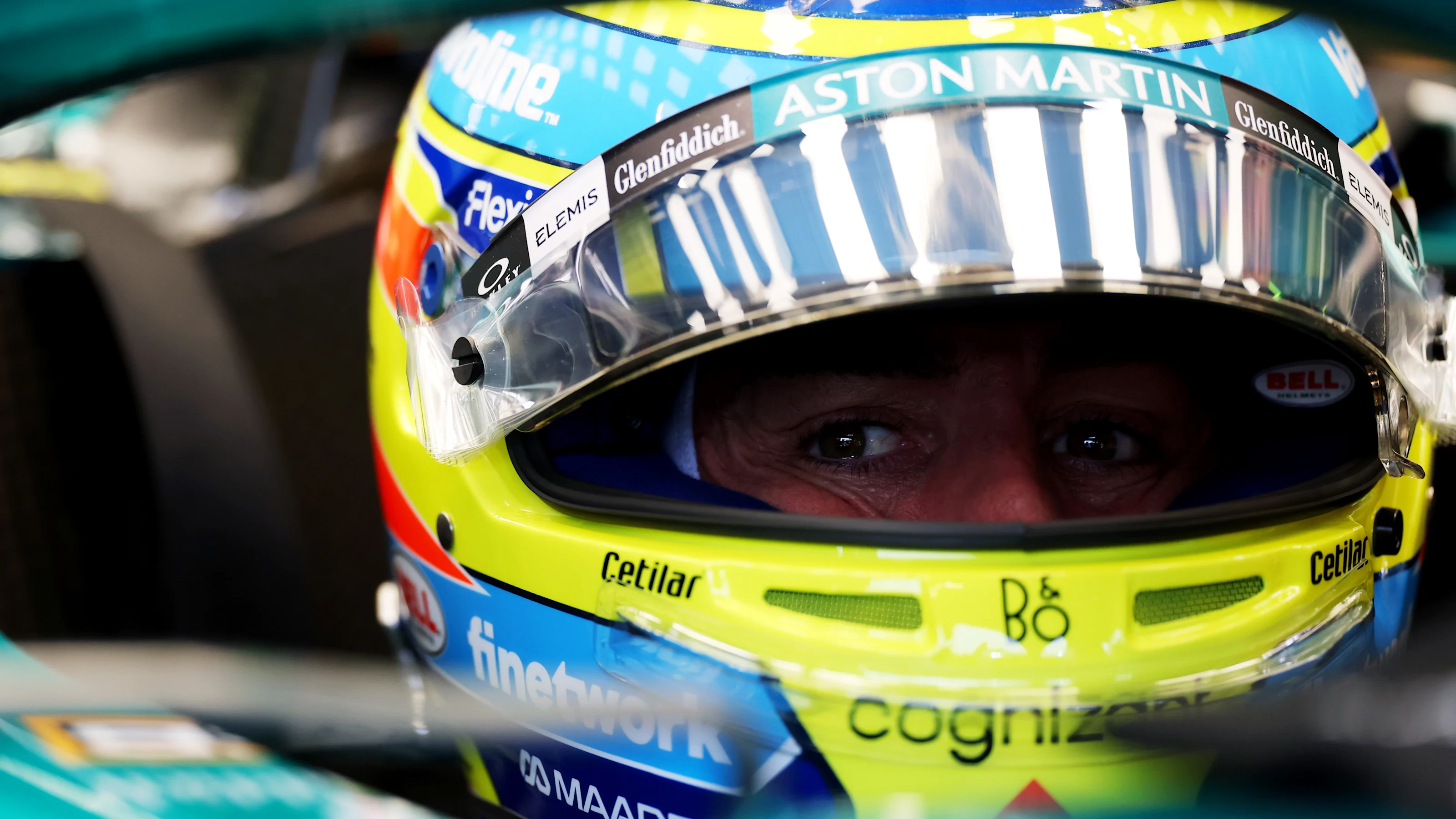 SINGAPORE, SINGAPORE - OCTOBER 04: Fernando Alonso of Spain and Aston Martin F1 Team prepares to