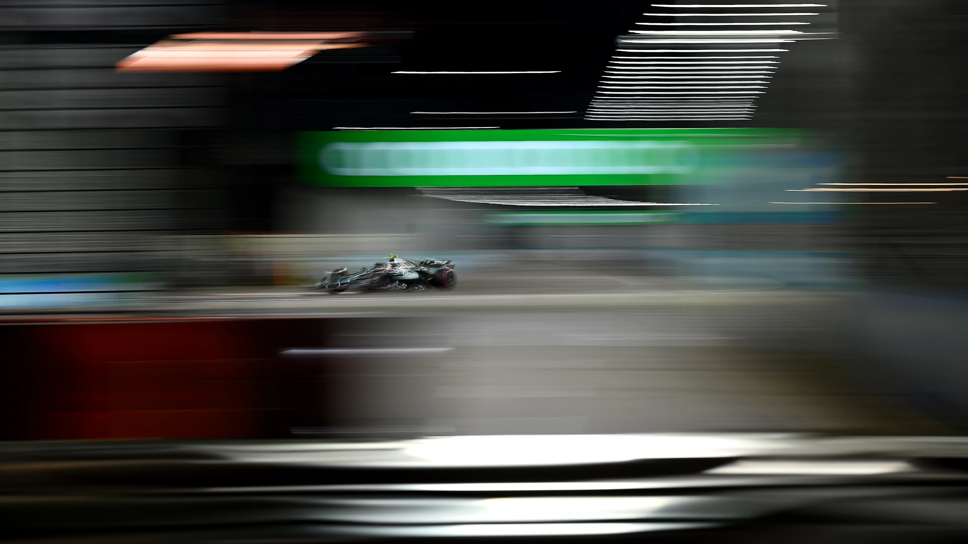 SINGAPORE, SINGAPORE - OCTOBER 04: Andrea Kimi Antonelli of Italy driving the (12) Mercedes AMG
