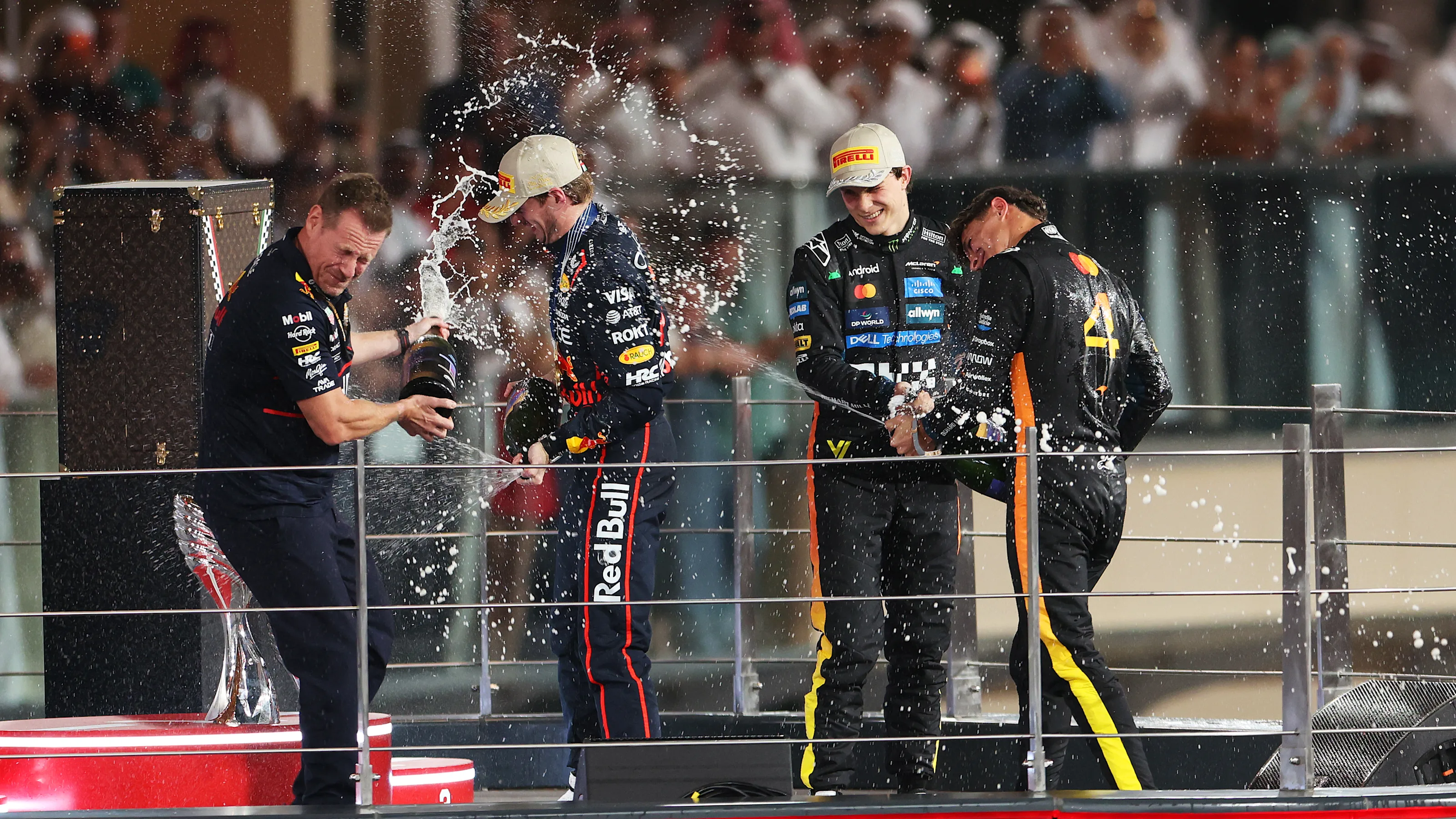 ABU DHABI, UNITED ARAB EMIRATES - DECEMBER 07: Race winner Max Verstappen of the Netherlands and