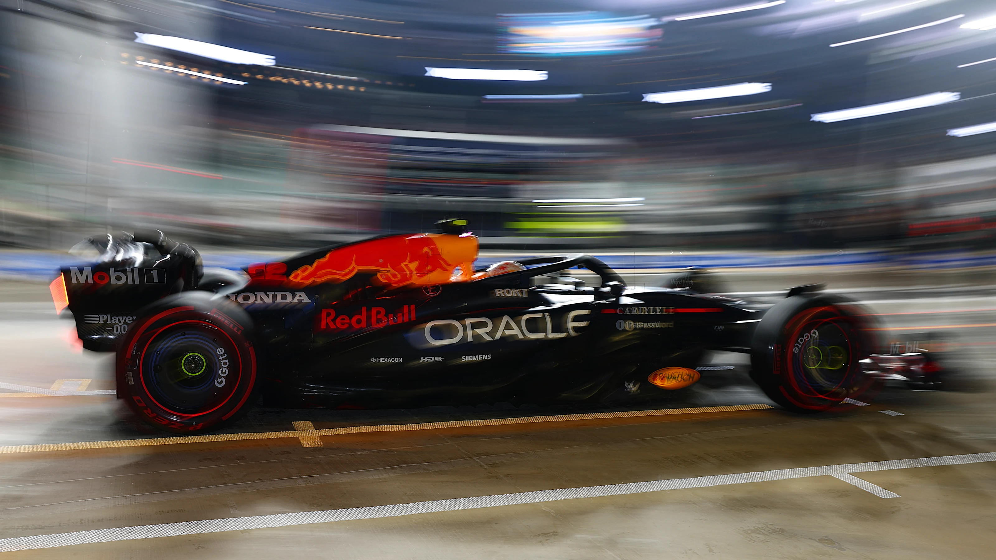 ABU DHABI, UNITED ARAB EMIRATES - DECEMBER 06: Yuki Tsunoda of Japan driving the (22) Oracle Red