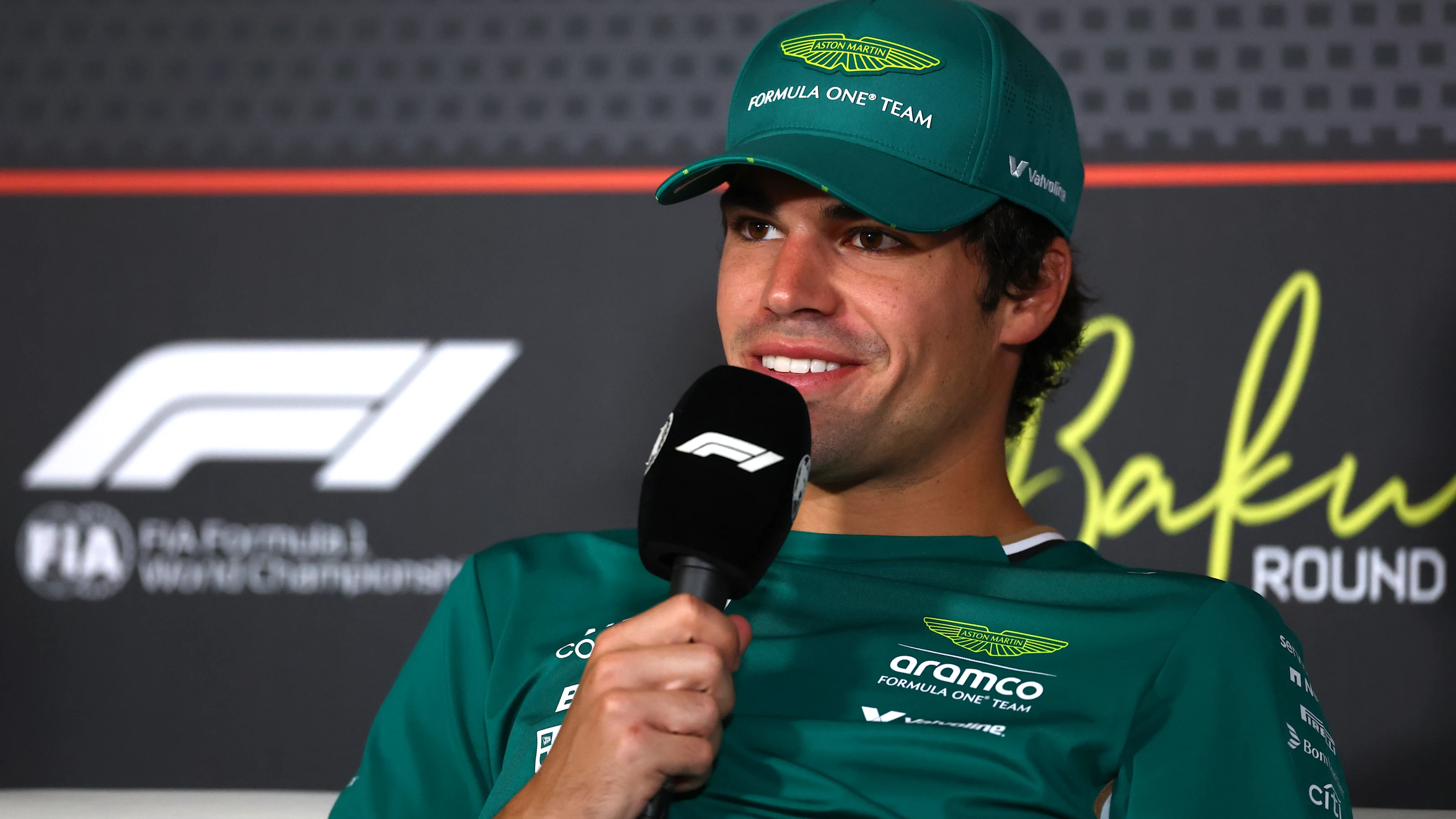 BAKU, AZERBAIJAN - SEPTEMBER 18: Lance Stroll of Canada and Aston Martin F1 Team speaks in the