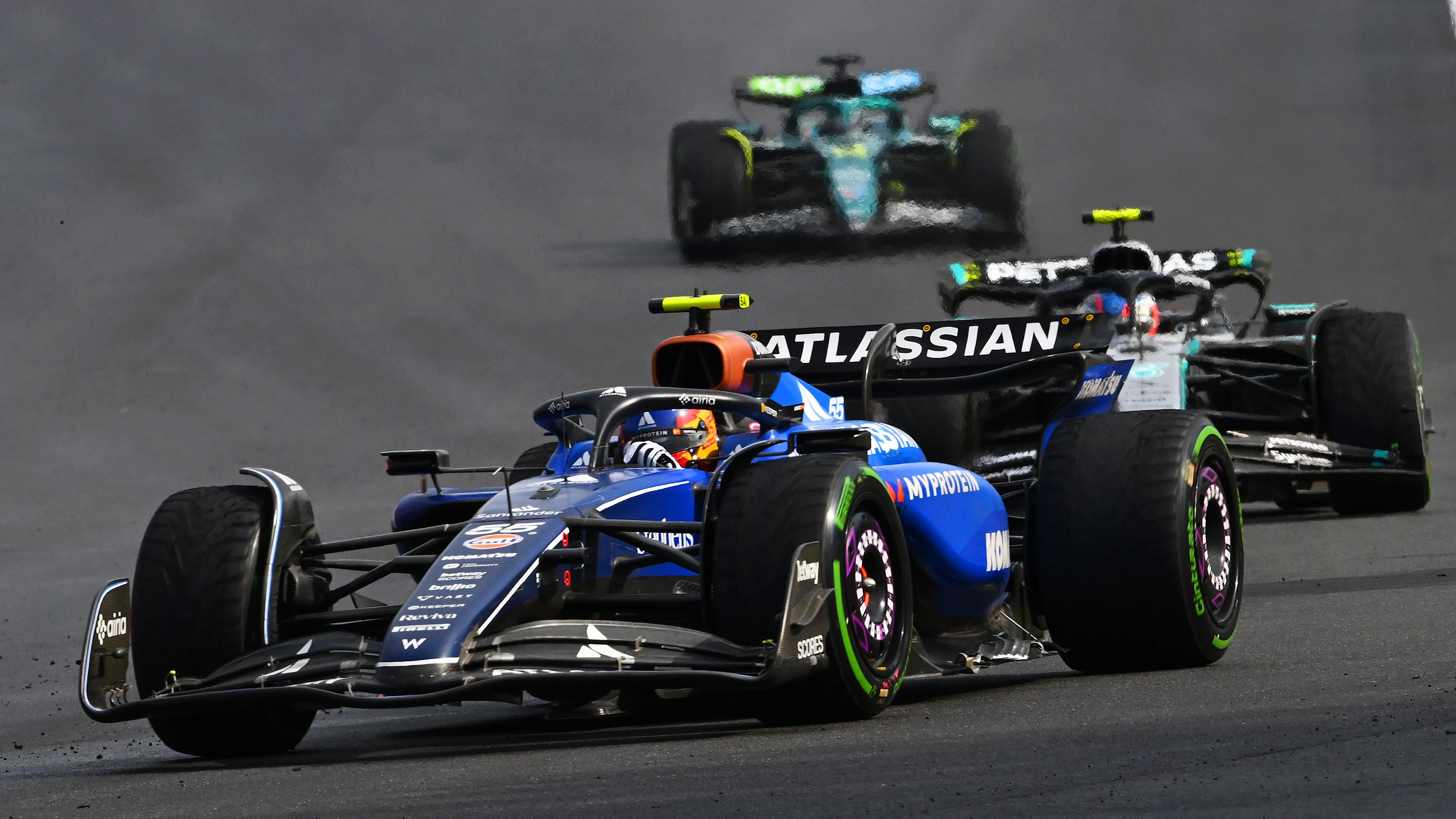 SPA, BELGIUM - JULY 27: Carlos Sainz of Spain driving the (55) Williams FW47 Mercedes leads Andrea