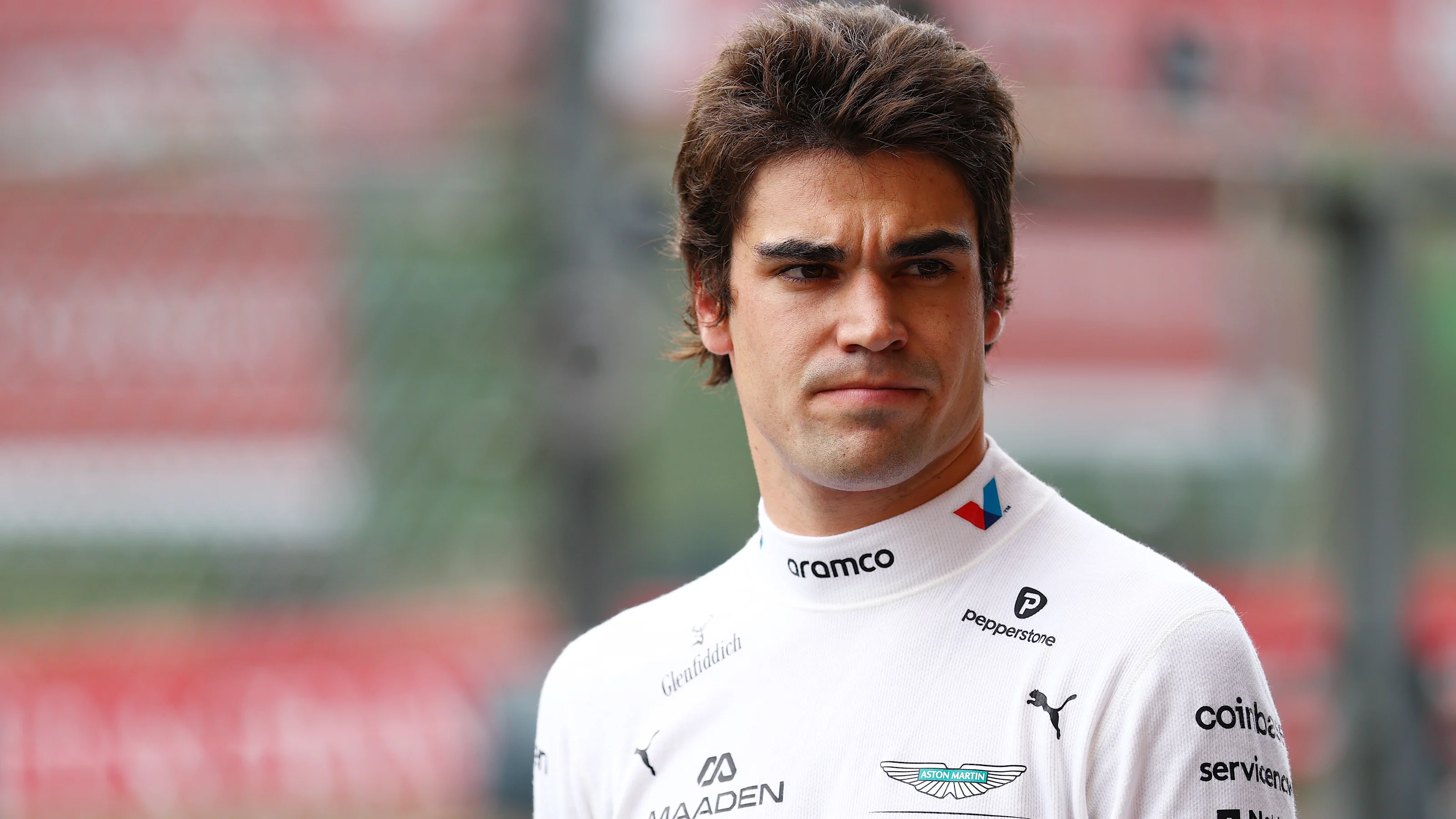 SPA, BELGIUM - JULY 26: Twentieth placed qualifier Lance Stroll of Canada and Aston Martin F1 Team