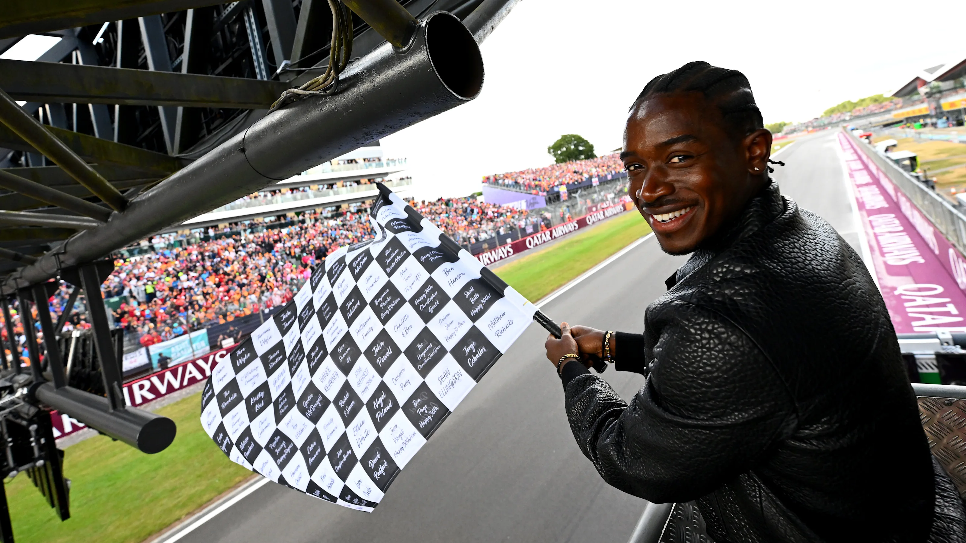 NORTHAMPTON, ENGLAND - JULY 06: Damson Idris, co-star of the Formula One based movie, F1 waves the