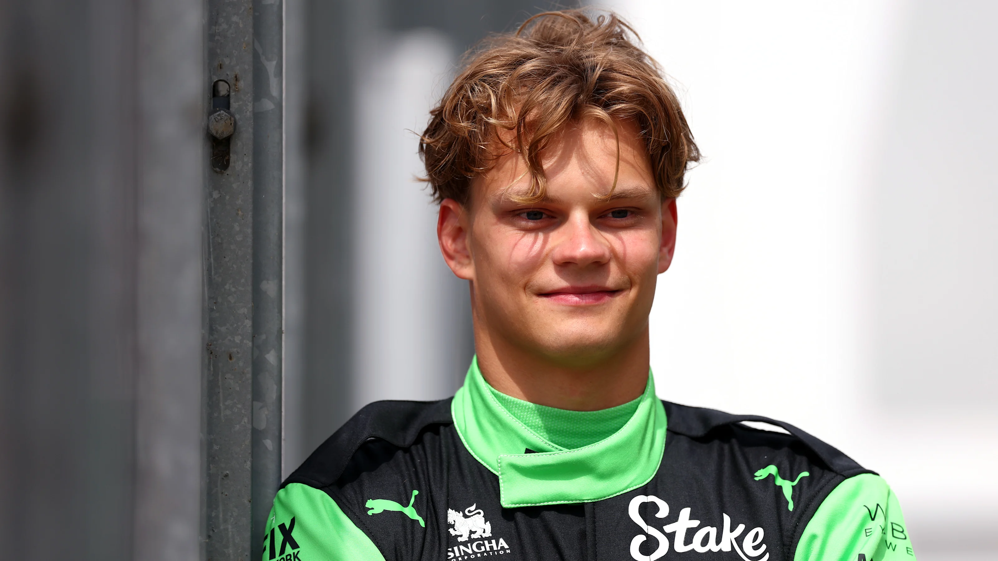 NORTHAMPTON, ENGLAND - JULY 03: Paul Aron of Estonia and Stake F1 Team Kick Sauber looks on during