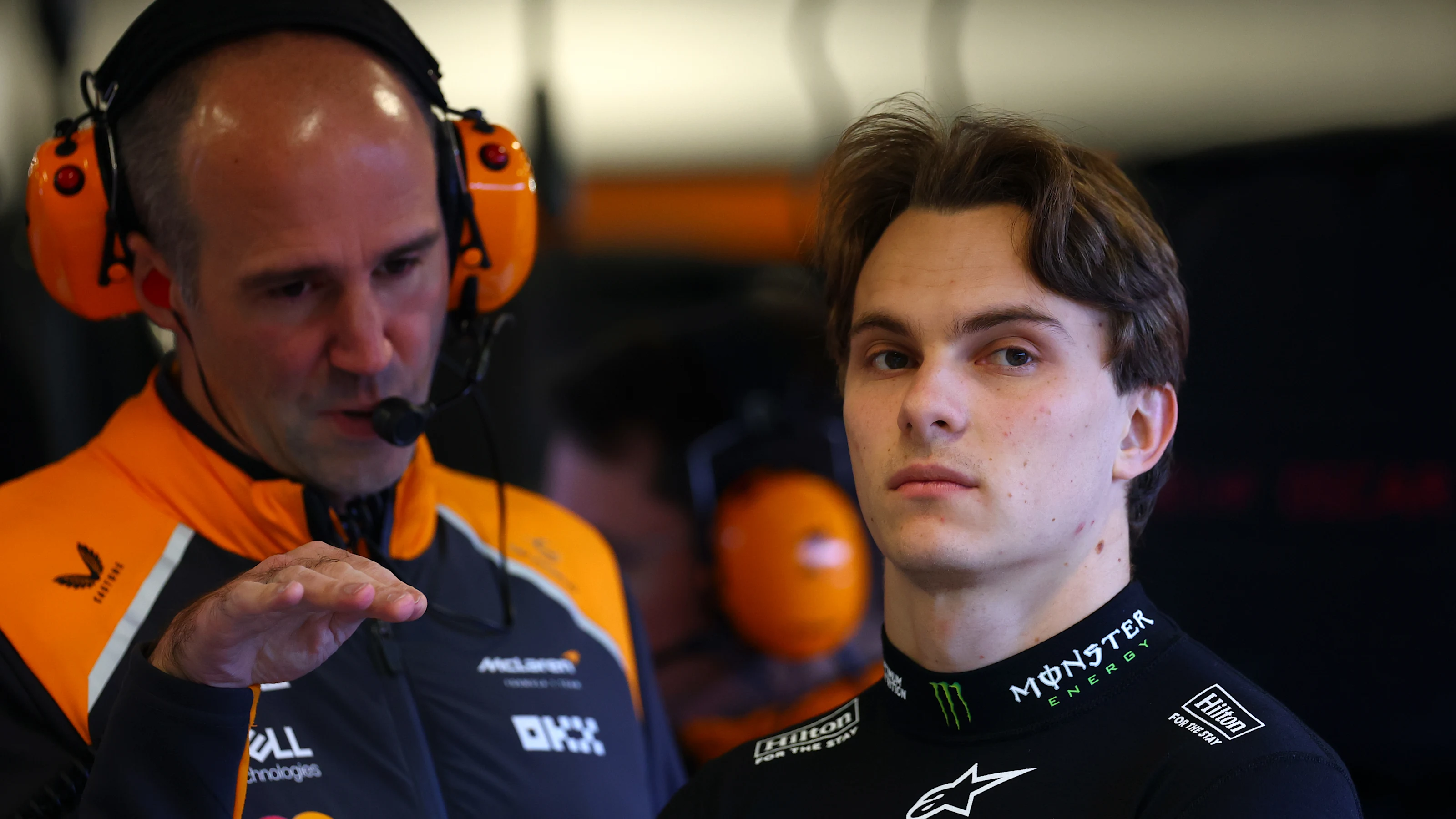 LAS VEGAS, NEVADA - NOVEMBER 20: Oscar Piastri of Australia and McLaren talks in the garage during