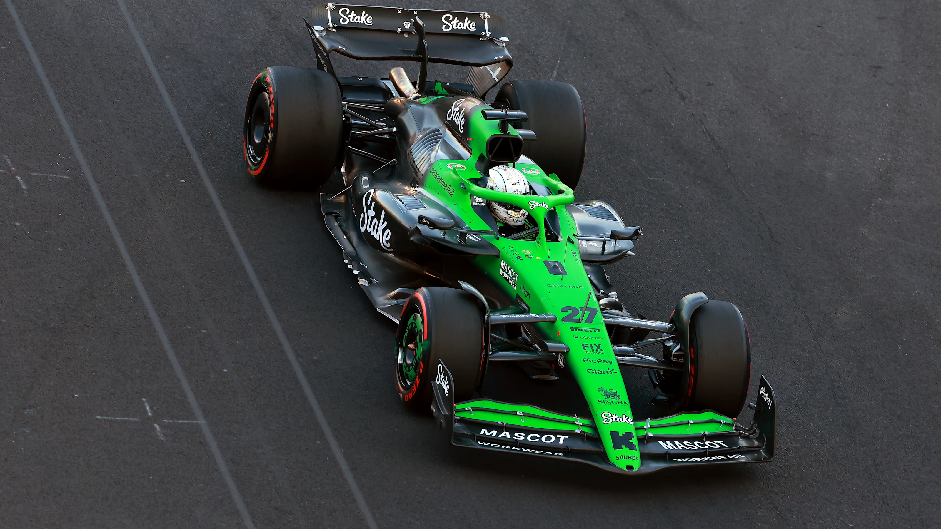 MEXICO CITY, MEXICO - OCTOBER 24: Nico Hulkenberg of Germany driving the (27) Kick Sauber C45