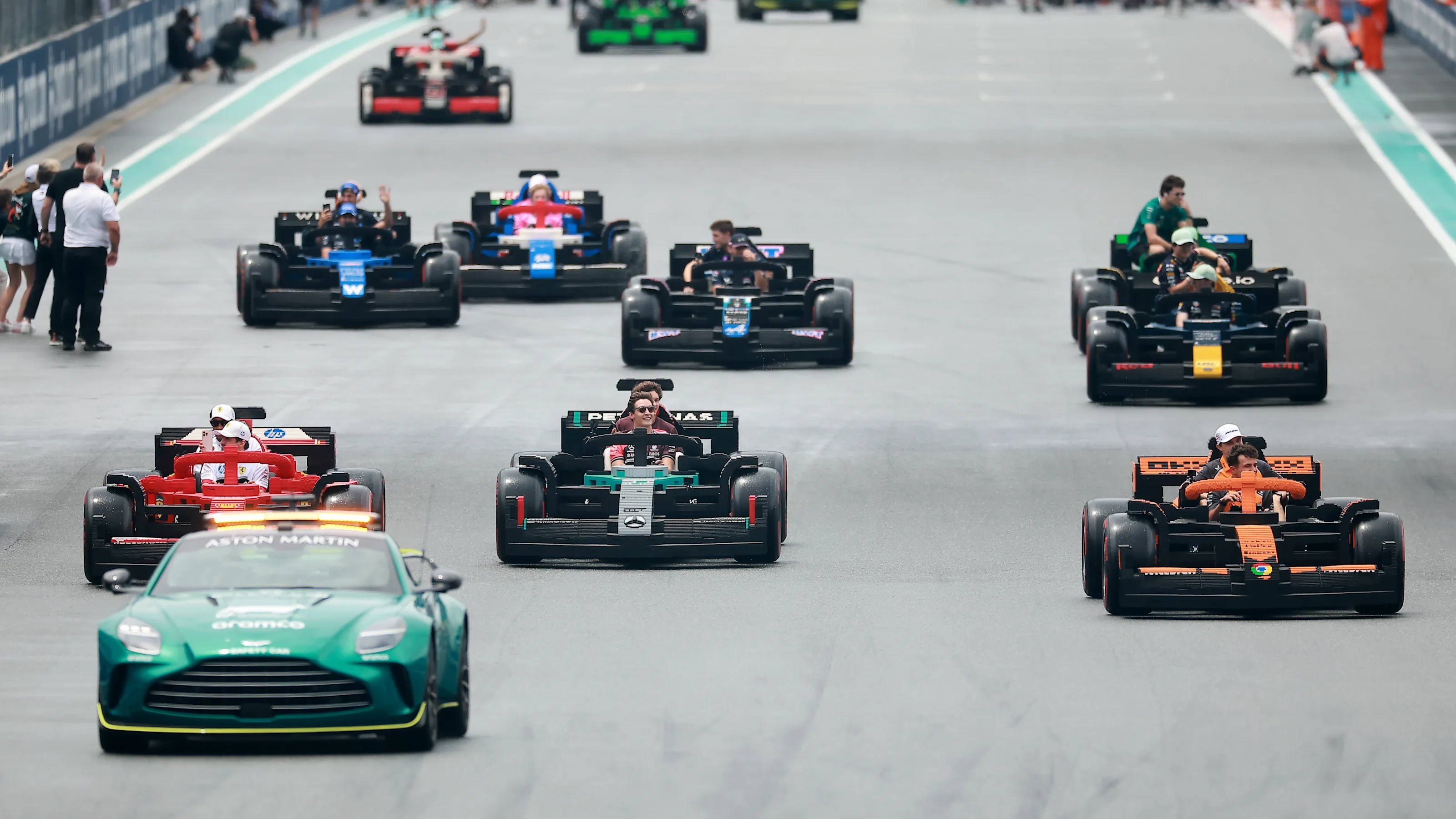 MIAMI, FLORIDA - MAY 04: The FIA Safety Car leads the Lego drivers parade prior to the F1 Grand